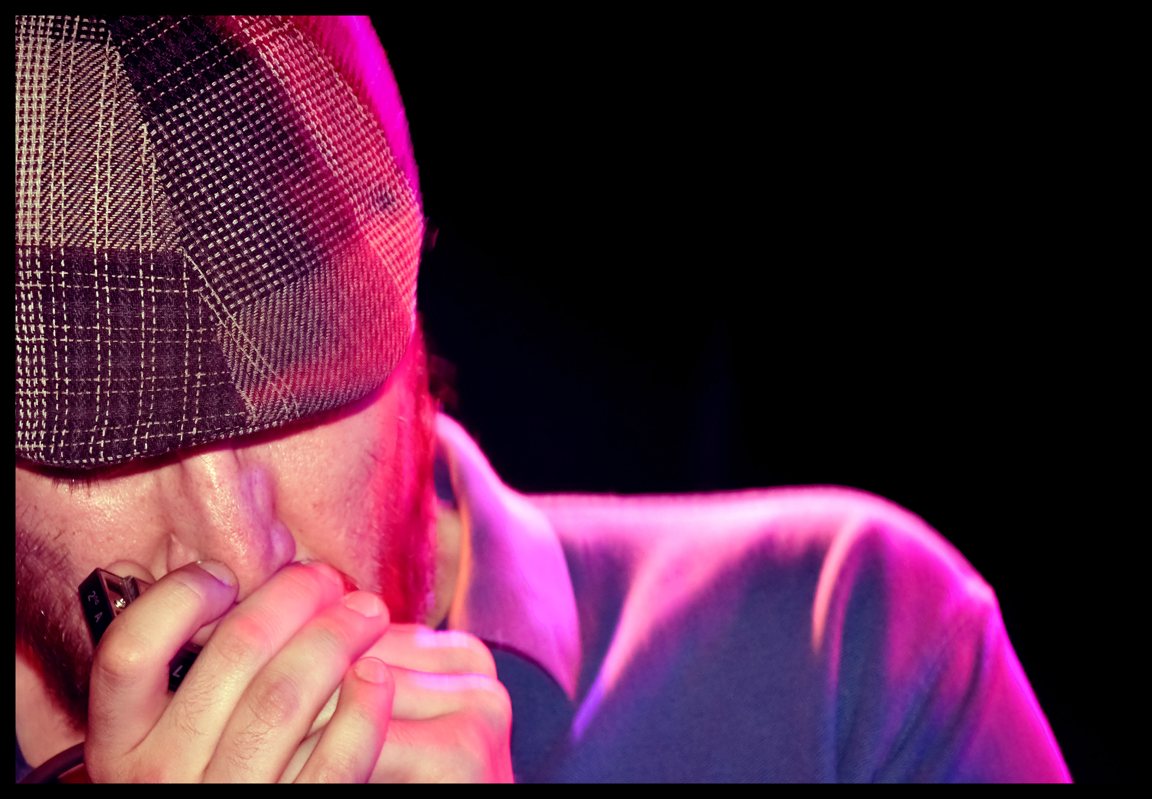 Music from the harmonica and soul.  Photo J. Joshua Diltz.  Alien Aftermint.