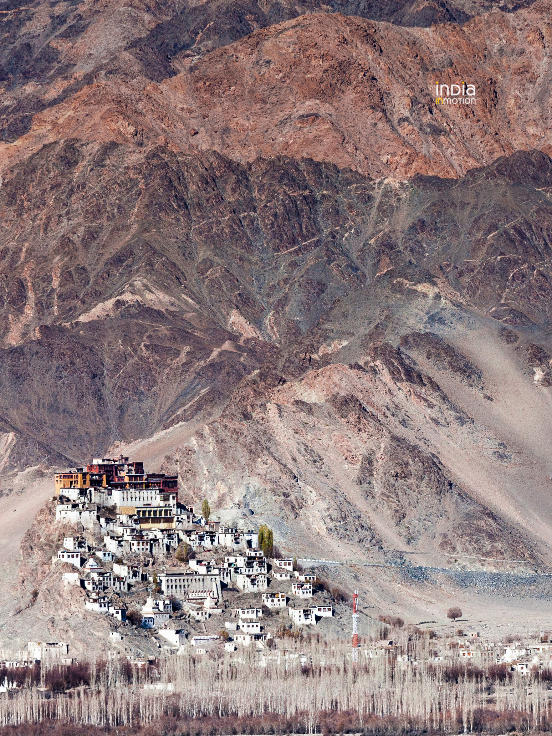 The many hues of the mountains behind the Thiksey monastery in Ladakh