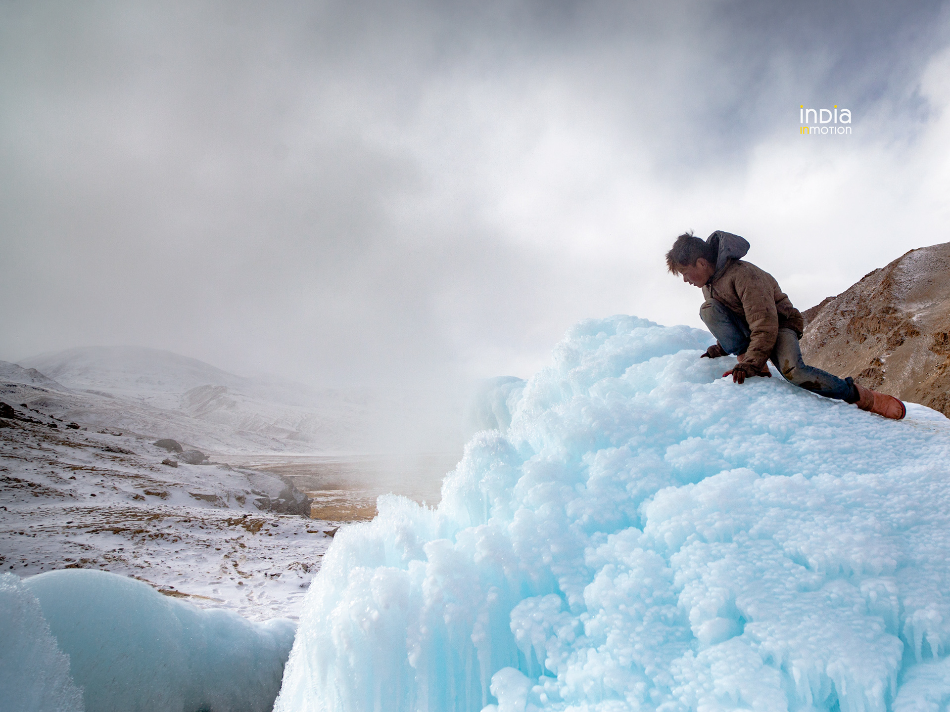 Peering over the edge of a frozen geyser at Puga, Ladakh