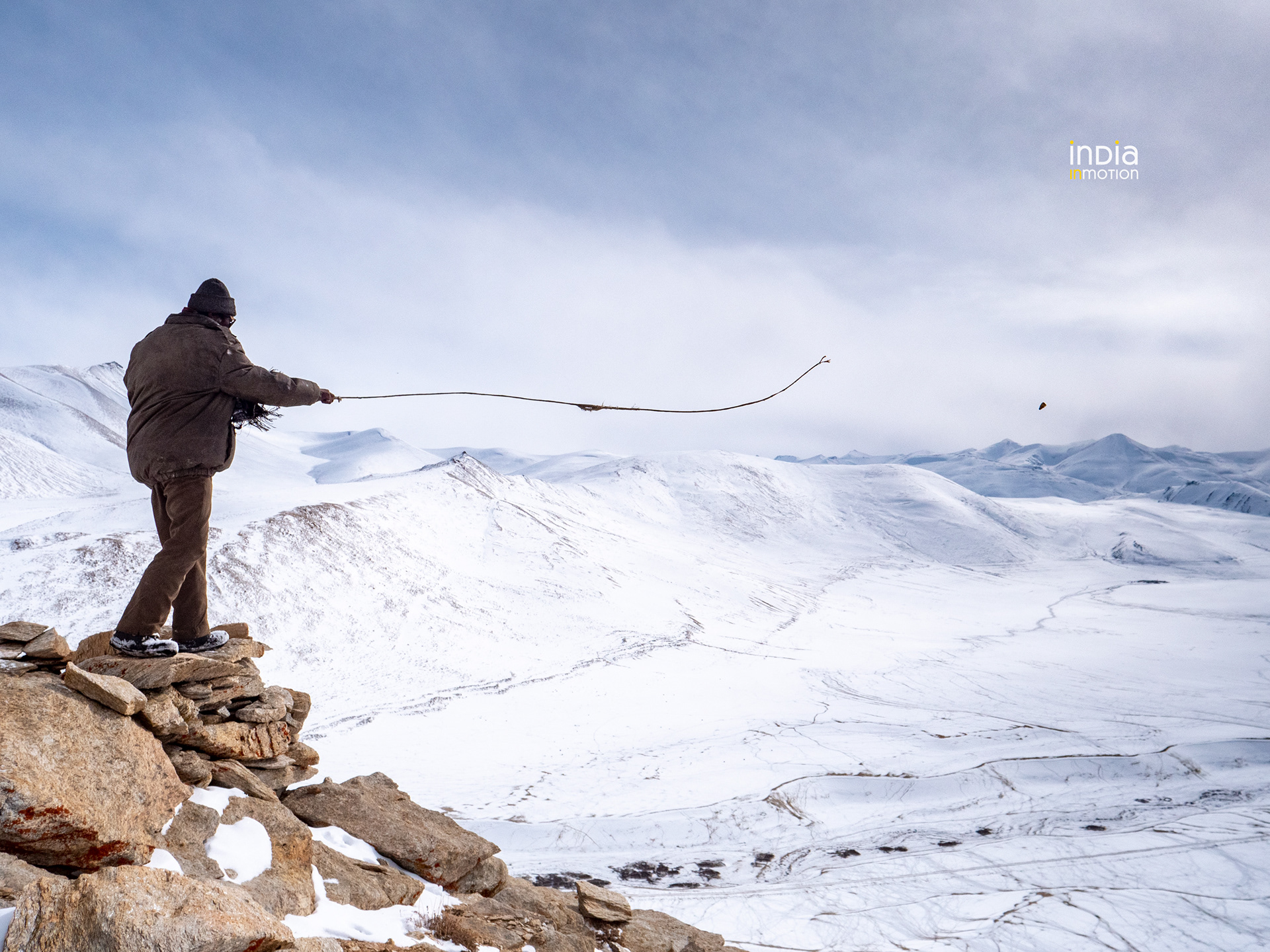 A Changpa nomad demonstrating his slingshot, the Yurdo.