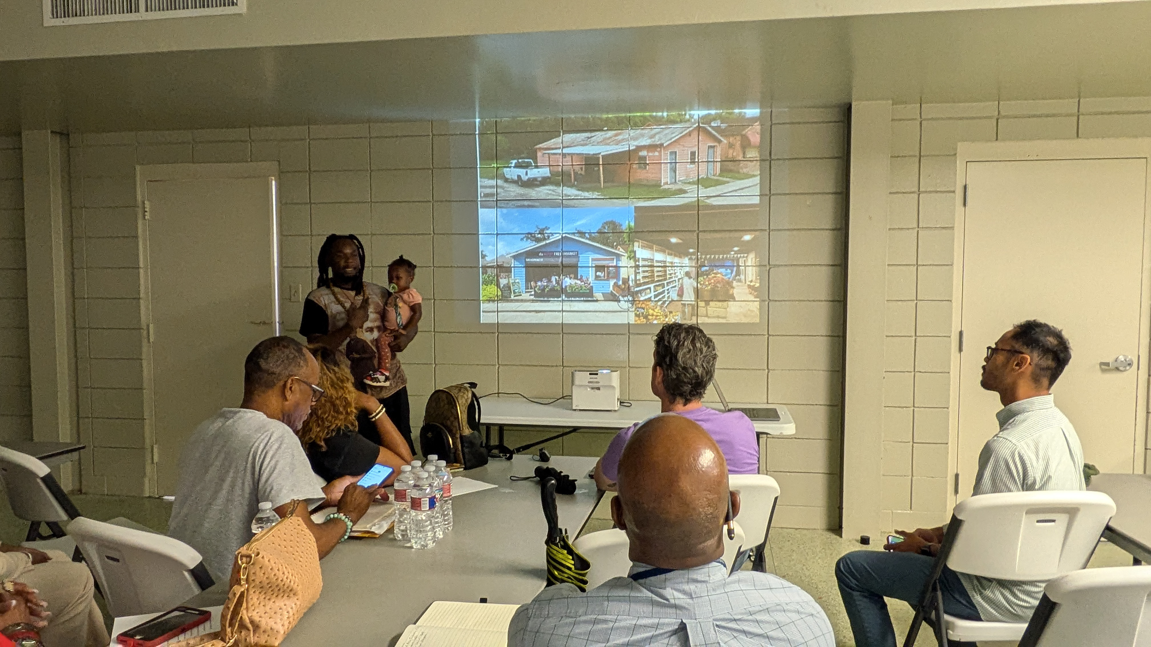 Market Manager Carl Cooper, Jr. introduces LHC to Da Berry Fresh Market