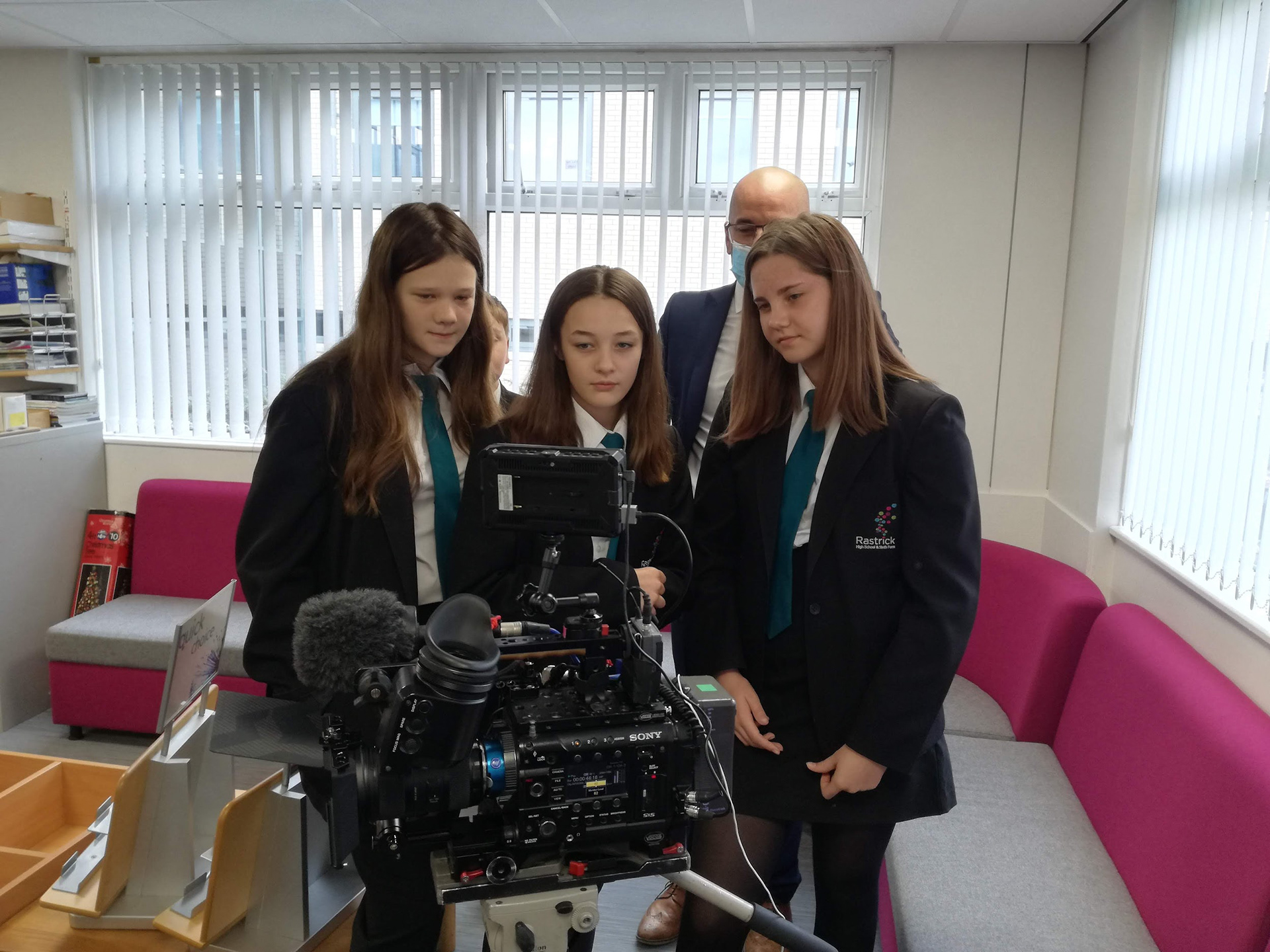 Students watch the playback