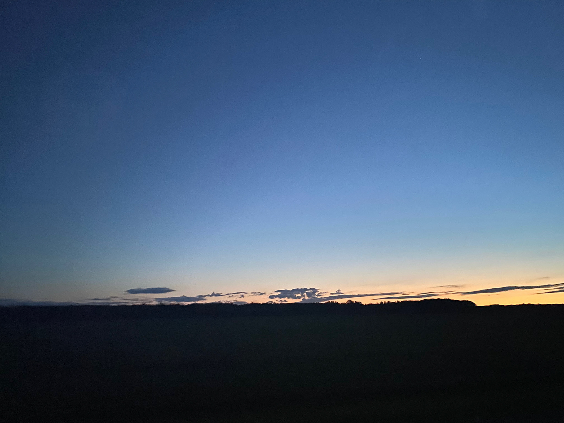 Sun and clouds and sunset during ride to the cottage - July 28-2022
