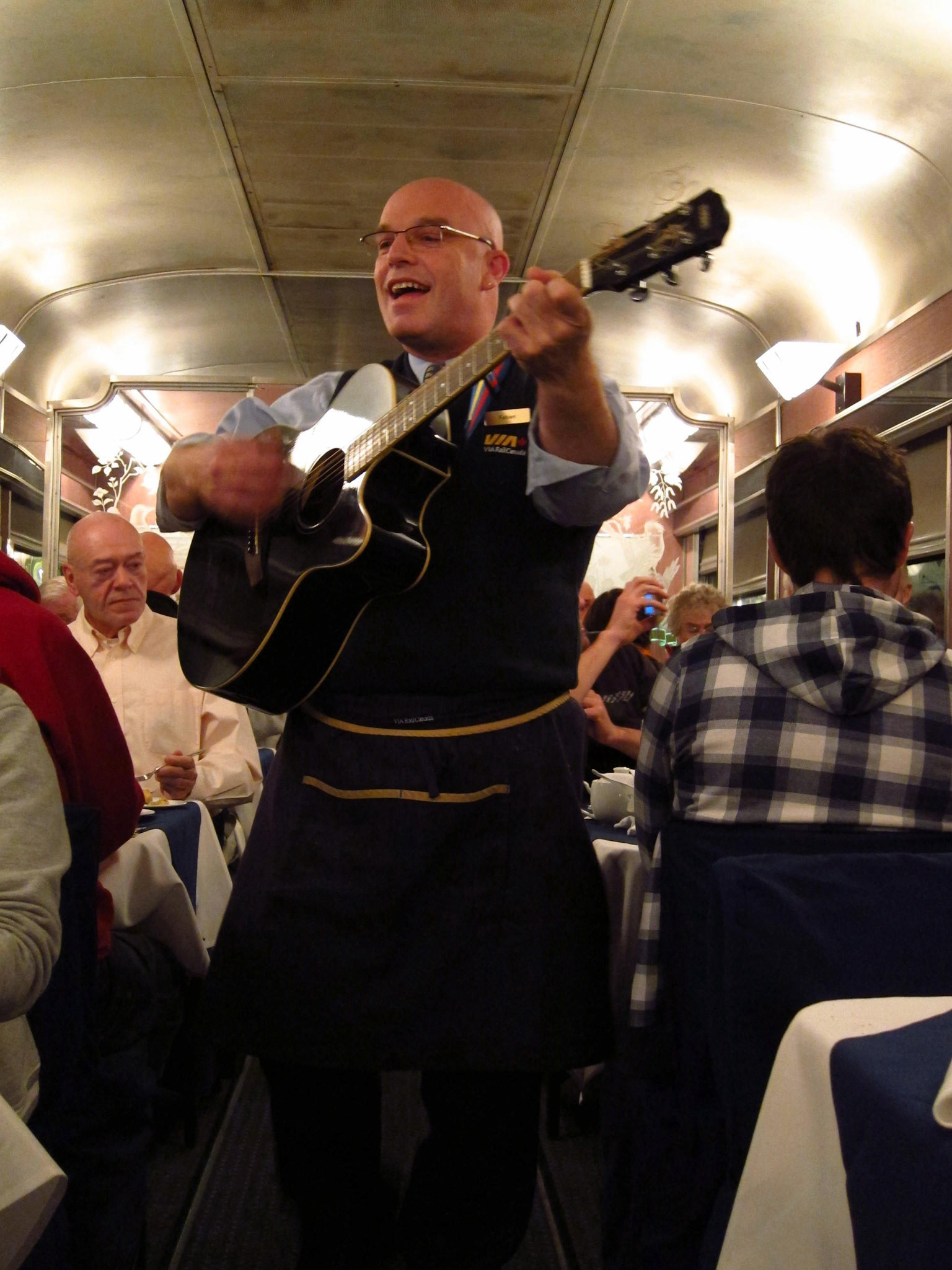 Fabien, a crew member on The Canadian, plays for us during dessert