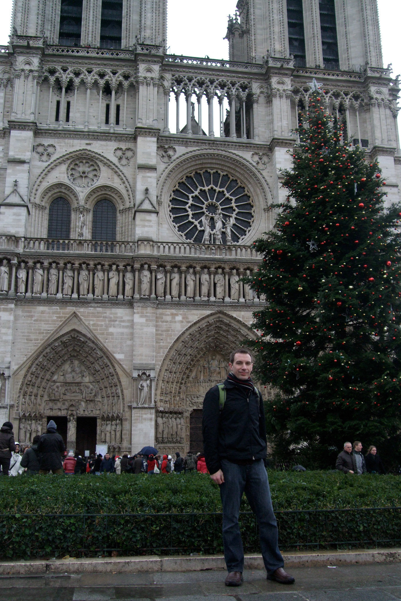 In front of the Notre Dame Christmas tree
