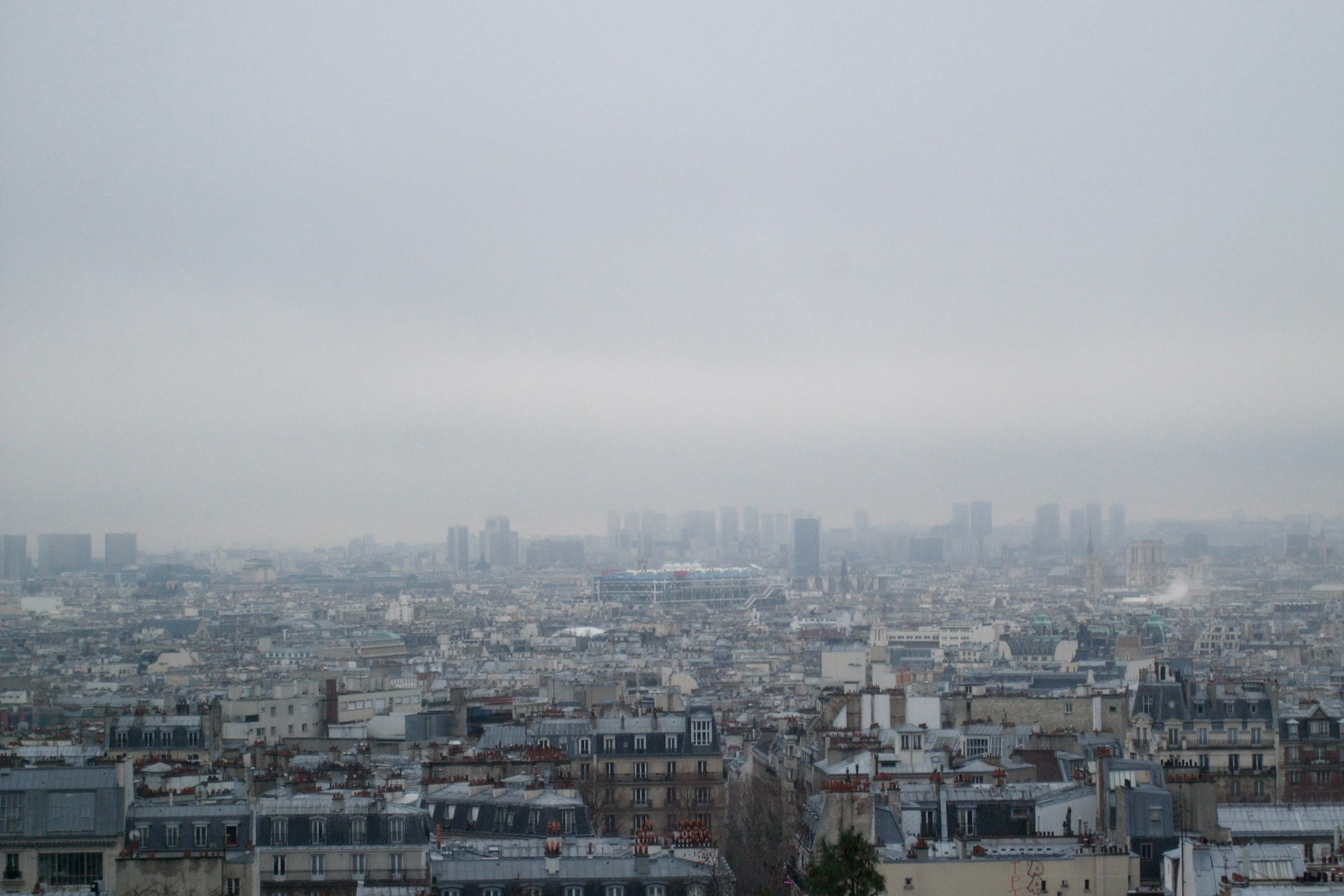 Looking out at the Parisian cityscape. The colourful factory-like building dead center is Centre Pompidou modern art museum