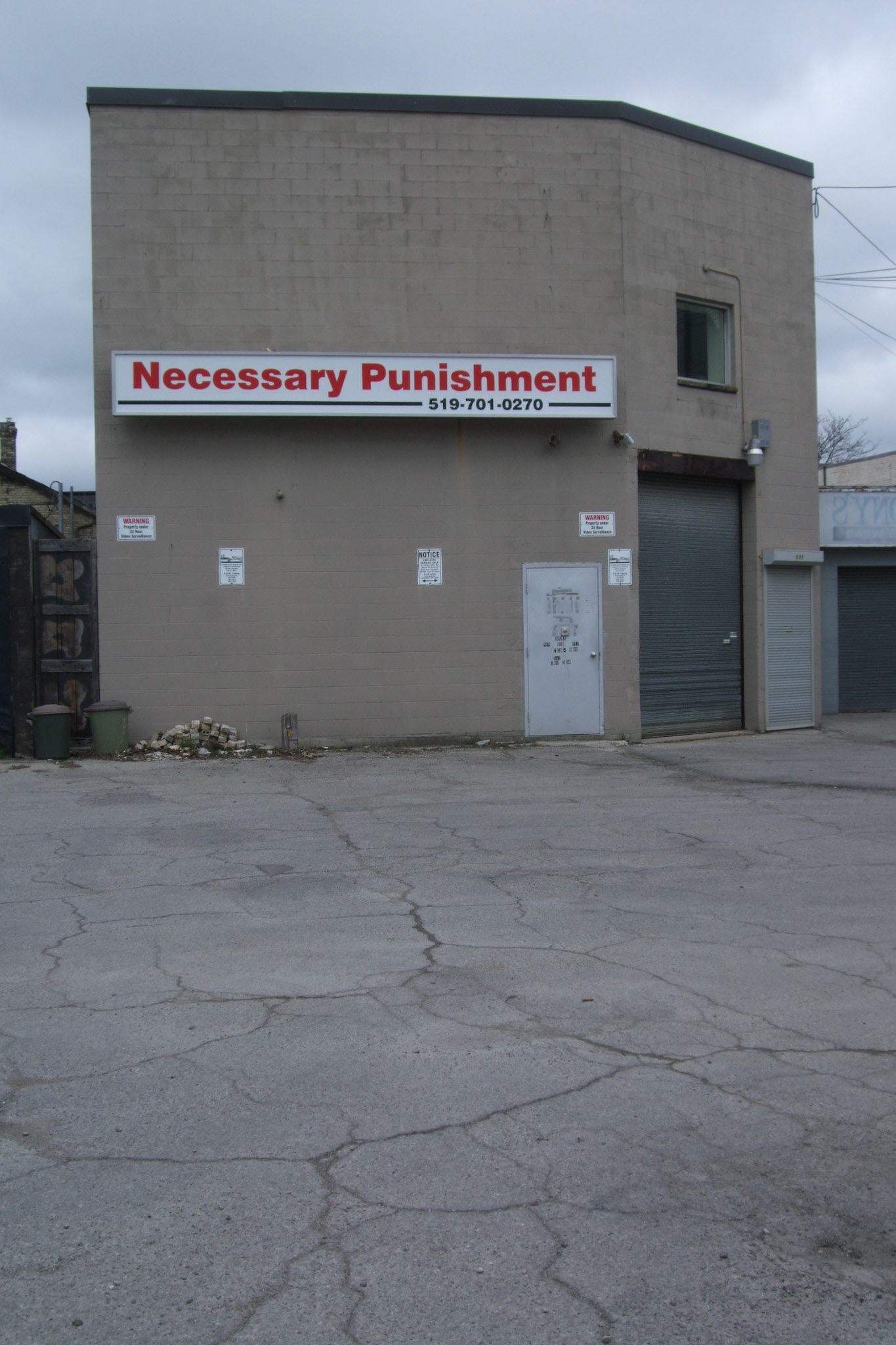 Necessary Punishment. Hmmm. I believe they were a martial arts training centre?? Hmmm...