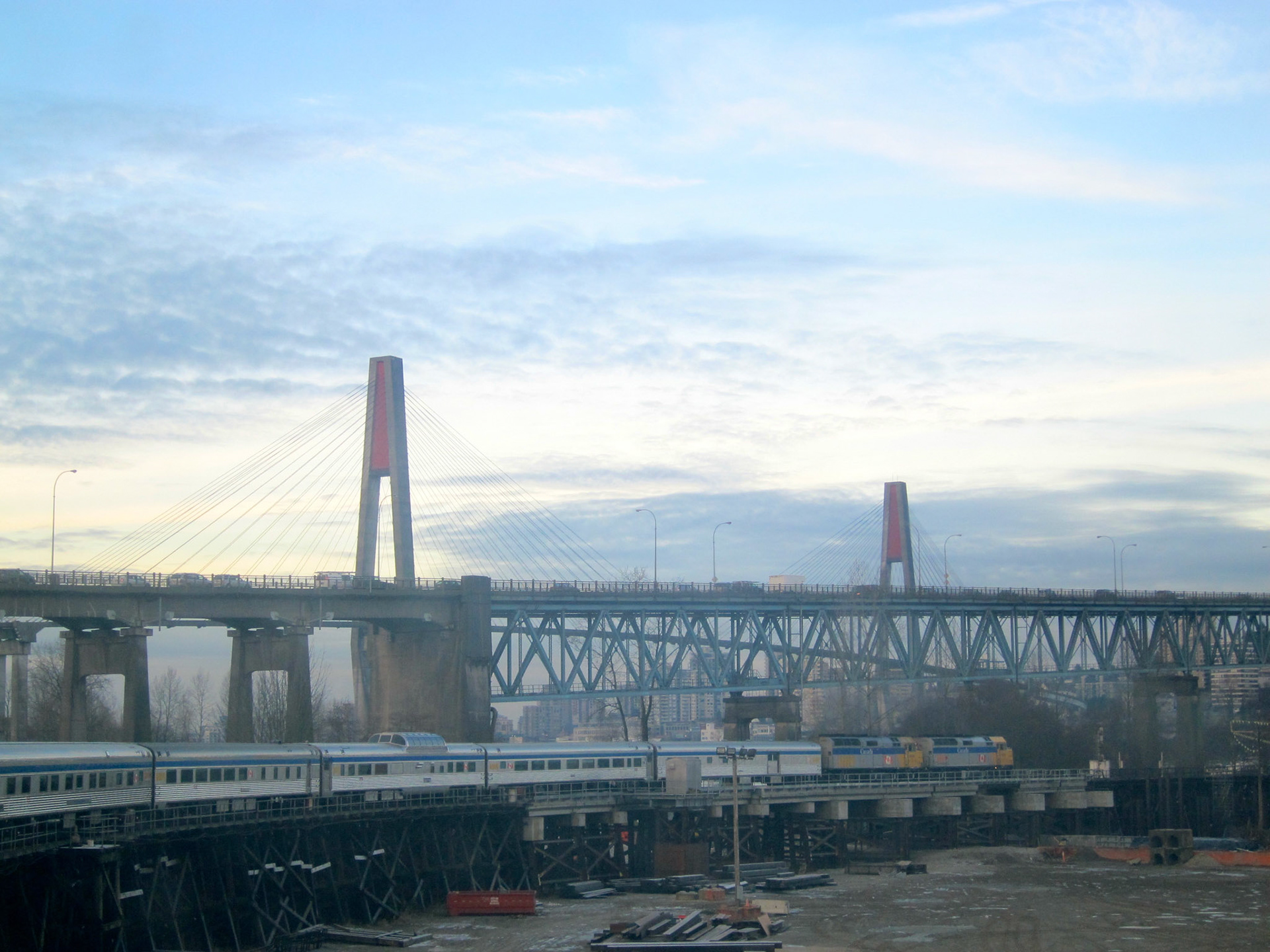 No, I didn't jump off the train to get this shot. The Canadian rounds a bend and approaches the Fraser River crossing. The beautiful cable-stayed Skybridge in the background