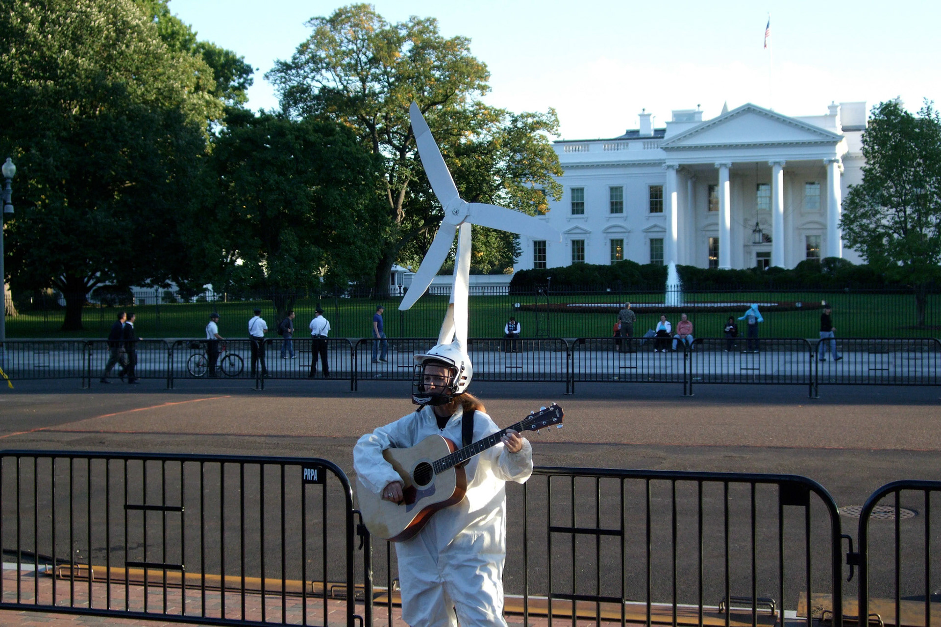 In front of the White House - it's cool checking out the various protestors. Unfortunately only two out this evening: this one advocating green energy