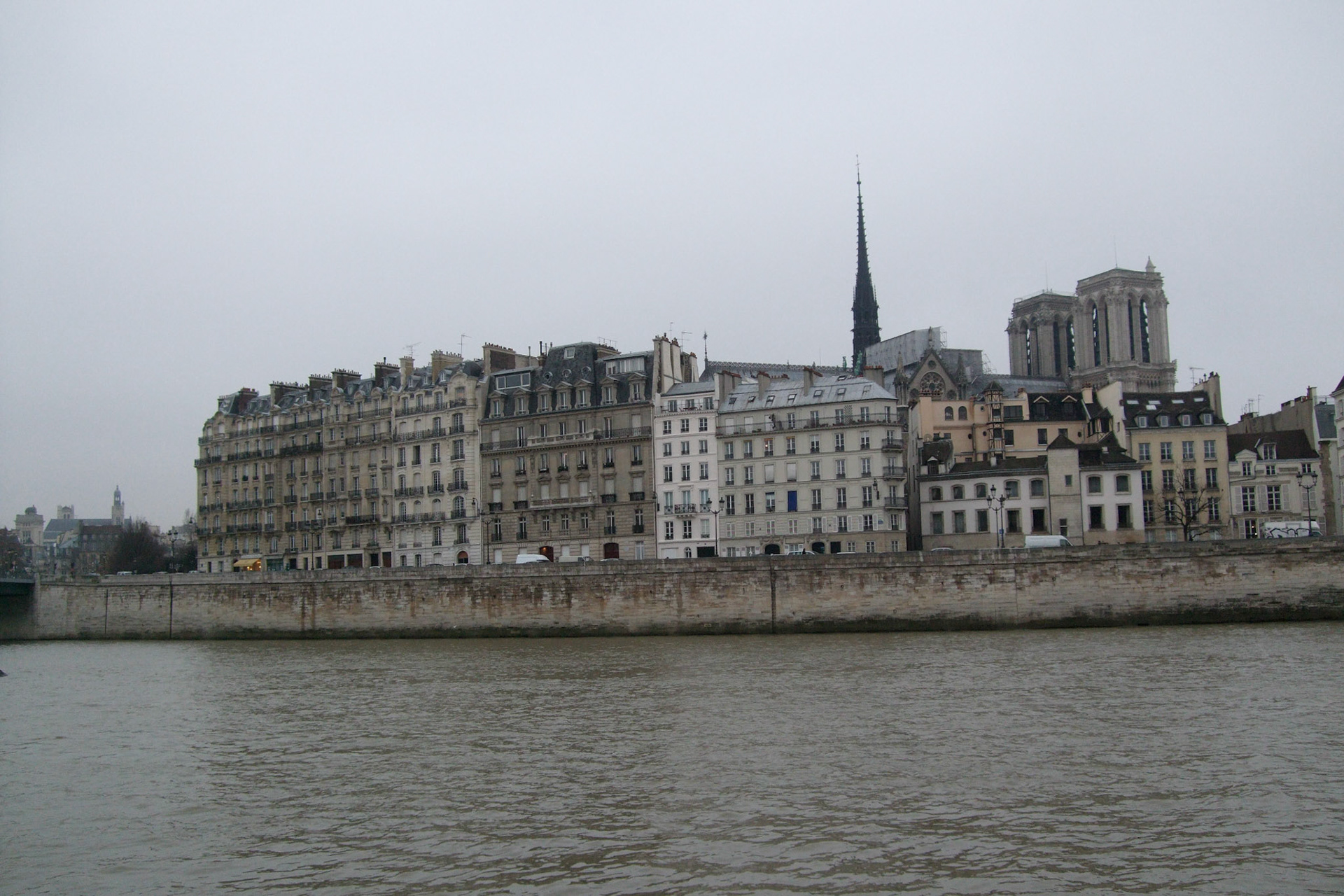 After lunch, we walked along the Seine. Notre Dame in the background