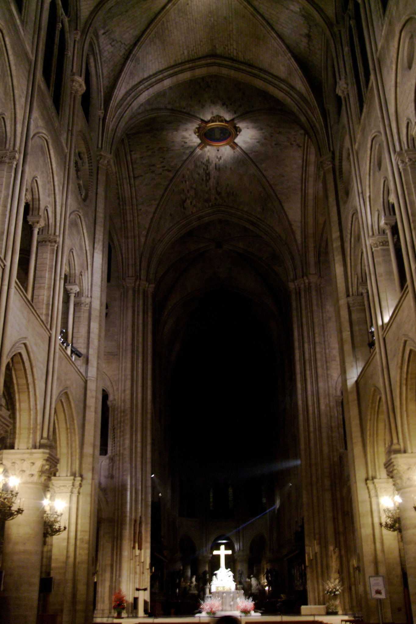 Inside Notre Dame at night after mass