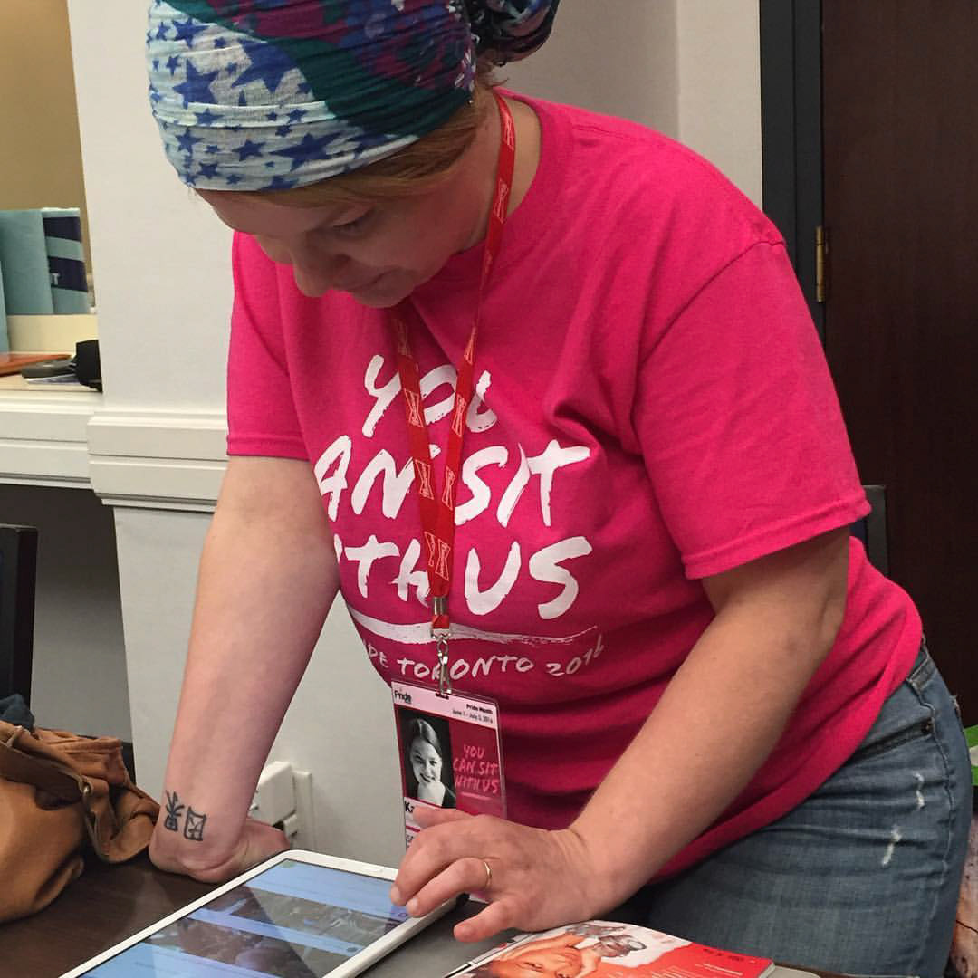 Behind the scenes! @kat.fortner (@katrinafortner) posting awesome content on #PrideTO social media.
