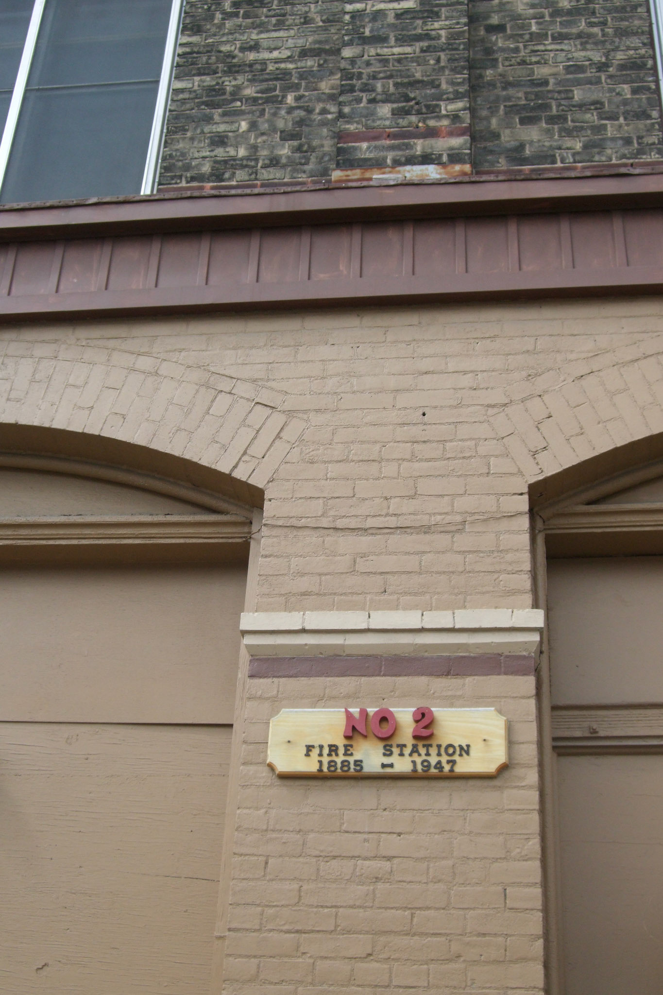 Signage at Aeolian Hall marking its history as a fire hall