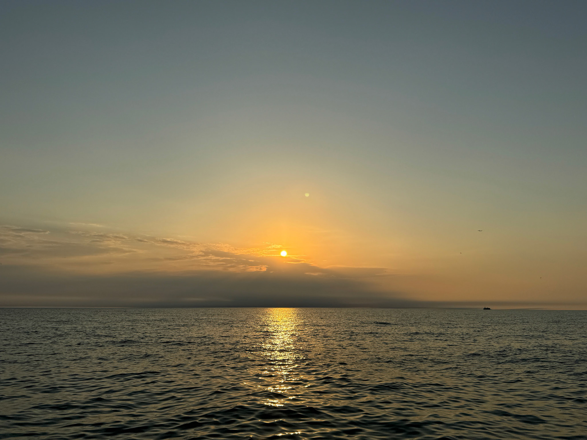 Morning breaks on the Chicago shoreline over Lake Michigan