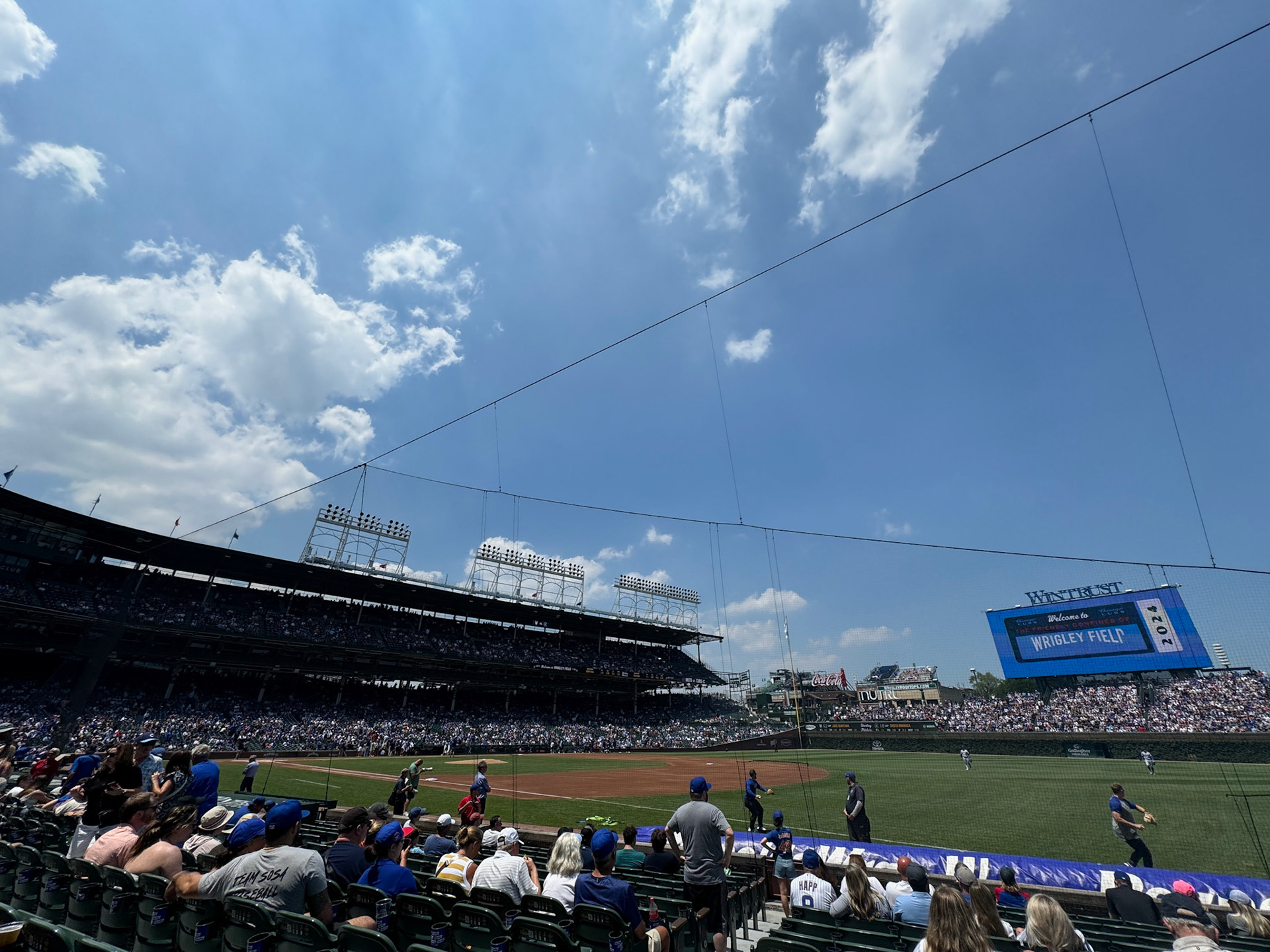 The ambiance at Wrigley Field and the crowd's energy were amazing