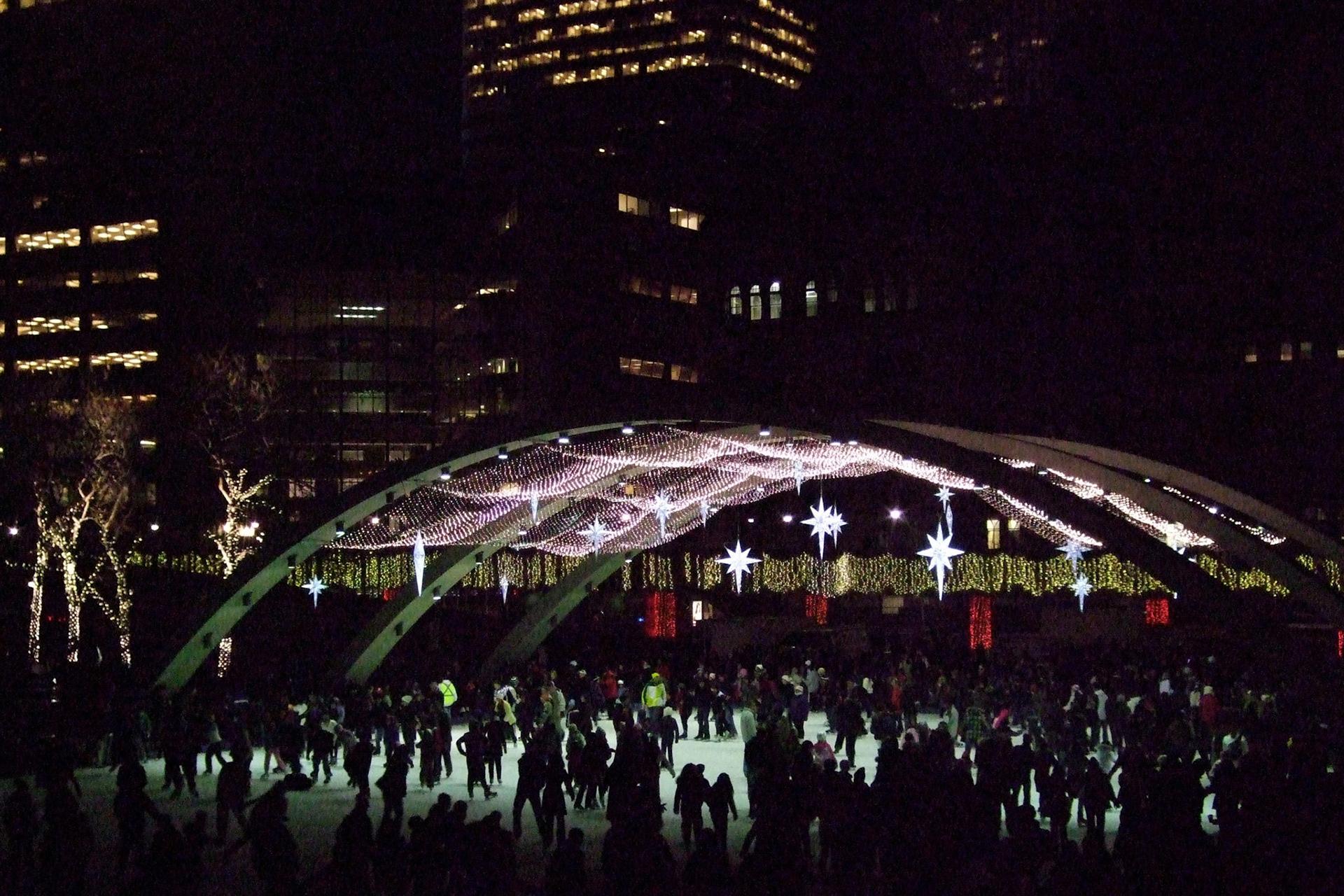 Kelly and I went to see Cavalcade of Lights at Nathan Phillips Square. Skating rink all lit up at night