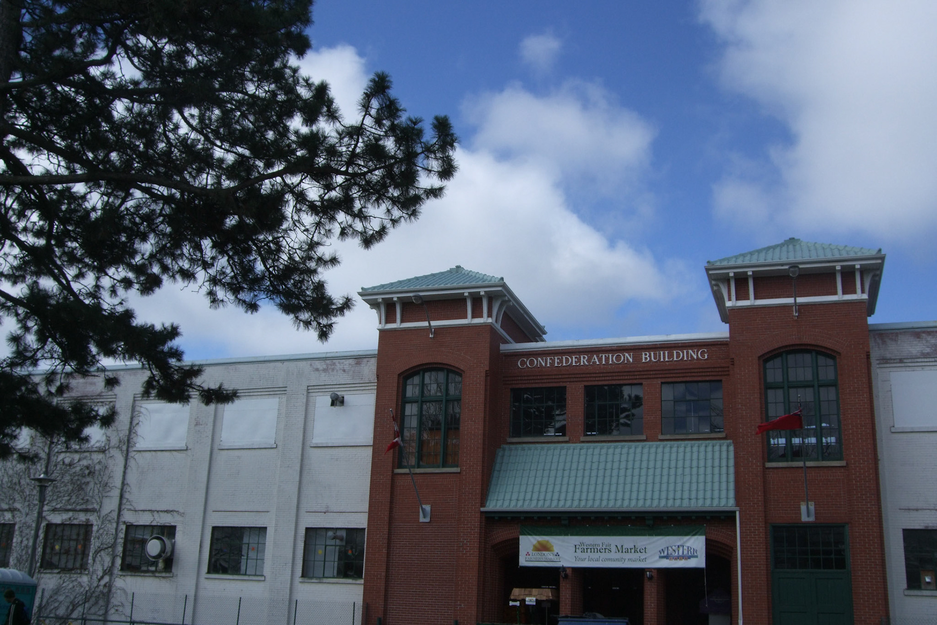 The Western Fair's Confederation Building houses a farmer's market. Neat towers at the entrance