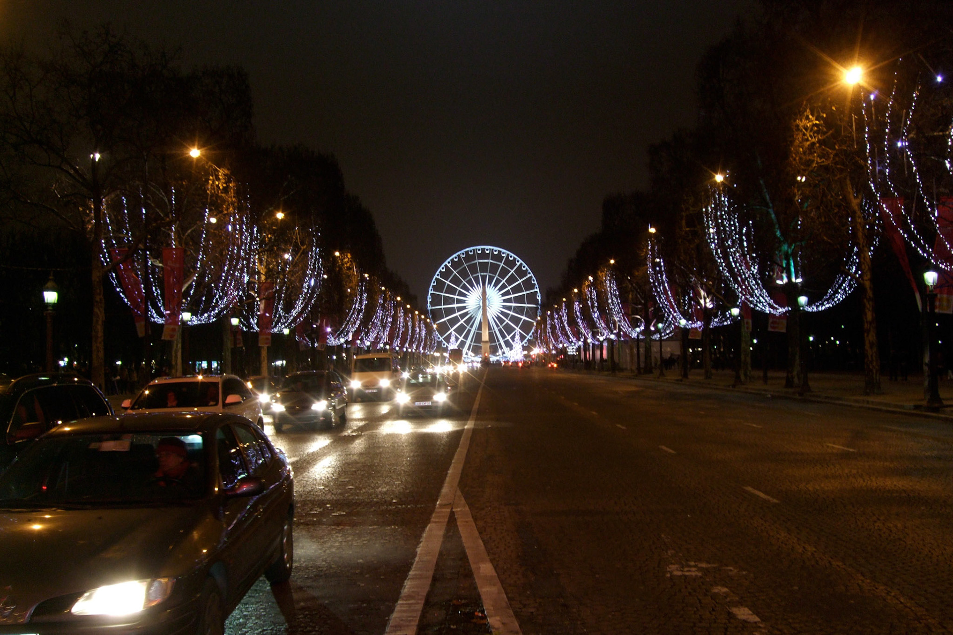 Walking down the Champs Elysees. Yes we walked on the sidewalk; the traffic islands help with these dangerous-looking photos