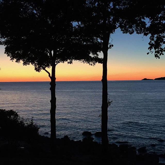 Super orange sky tonight. The calm after the storm - it was so windy on Georgian Bay last night.