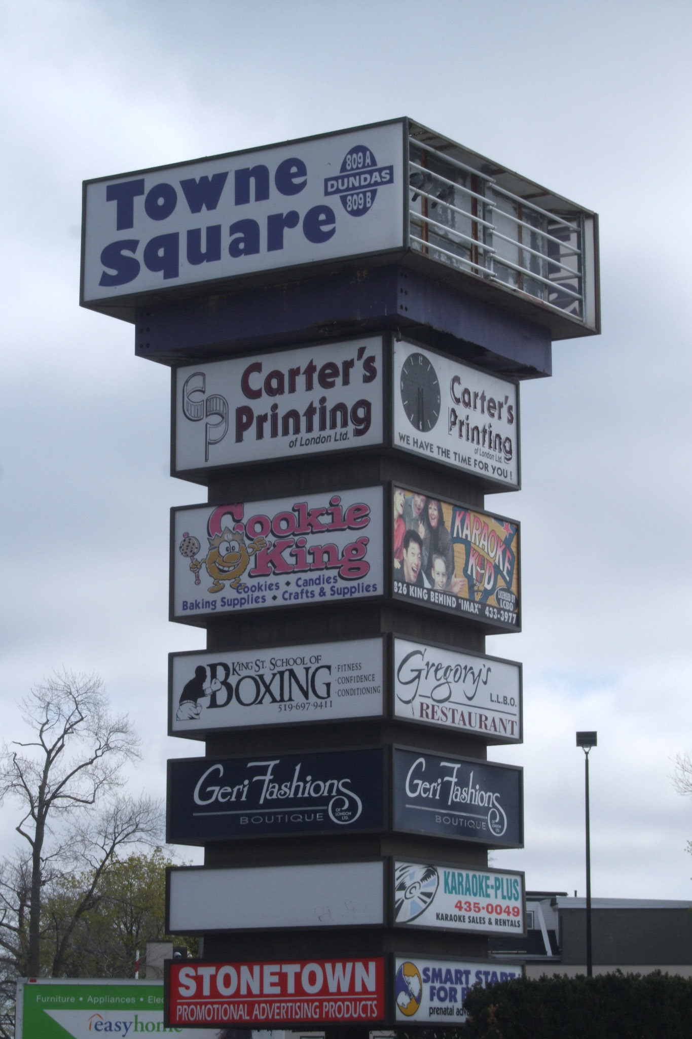 The interesting stacked Towne Square sign