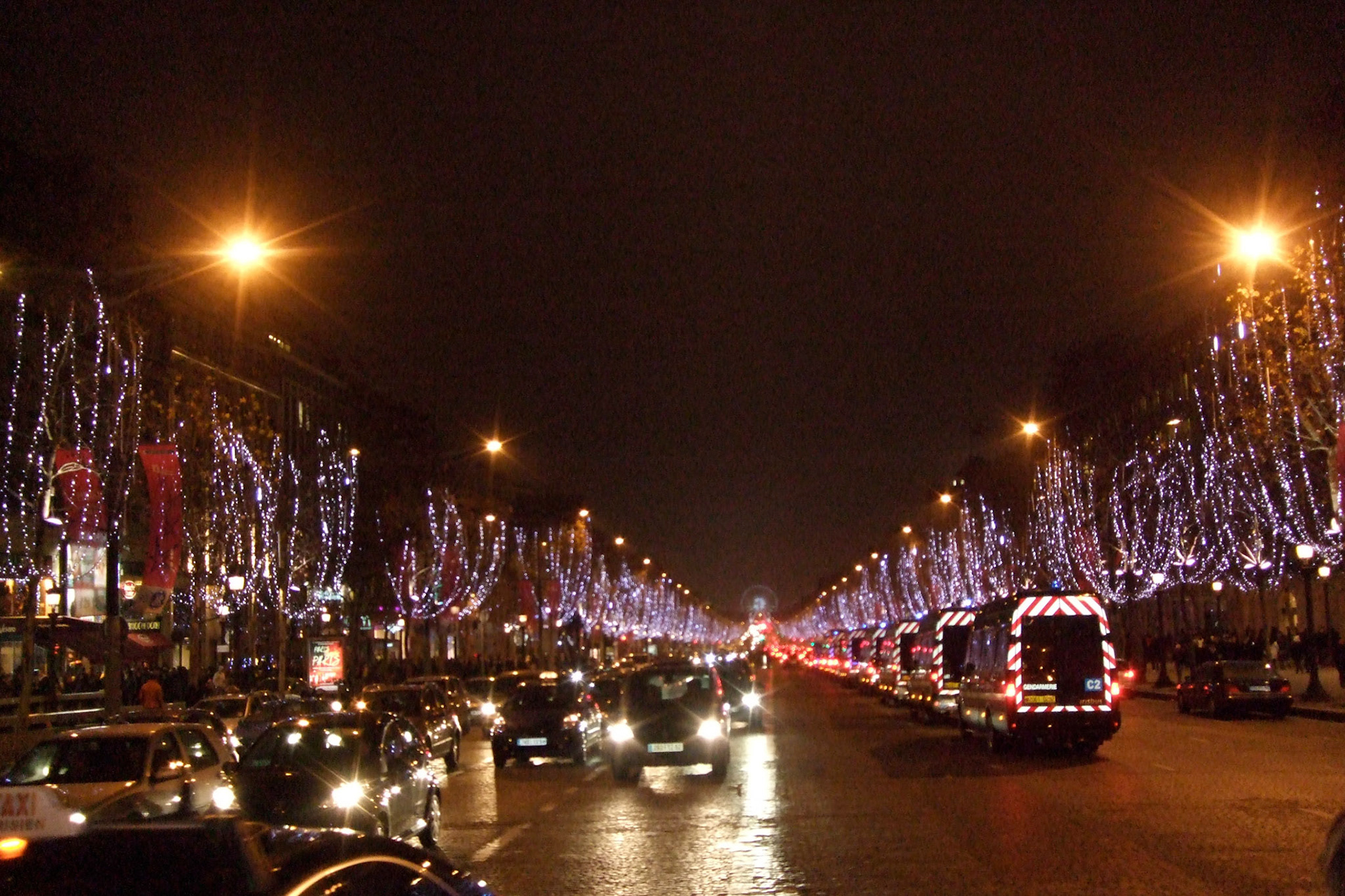 Sign of the excitement ahead for New Years at the Champs Elysees - the line of police trucks running up and down the avenue.