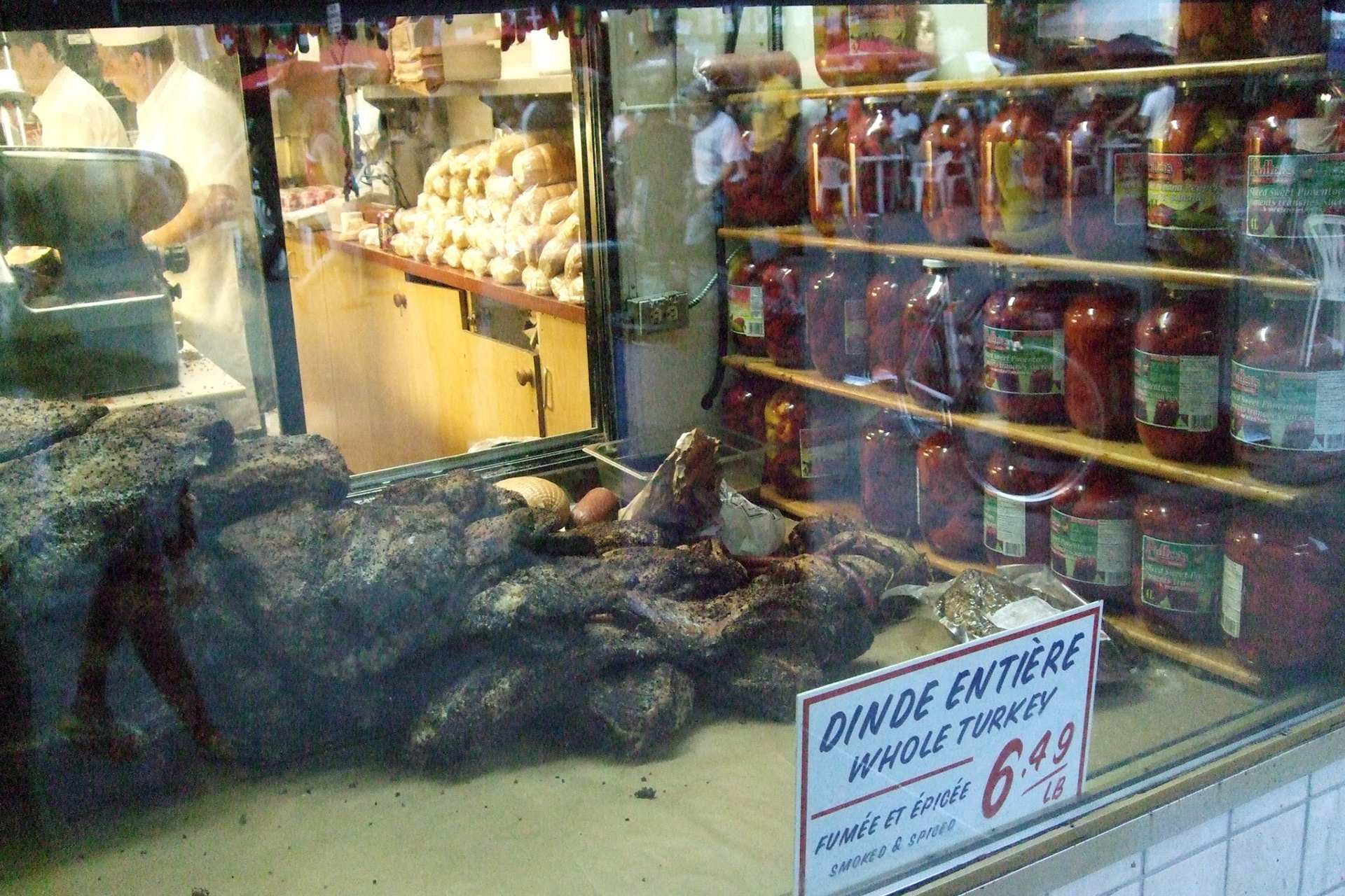 Montreal smoked meat curing in the front window of Schwartz
