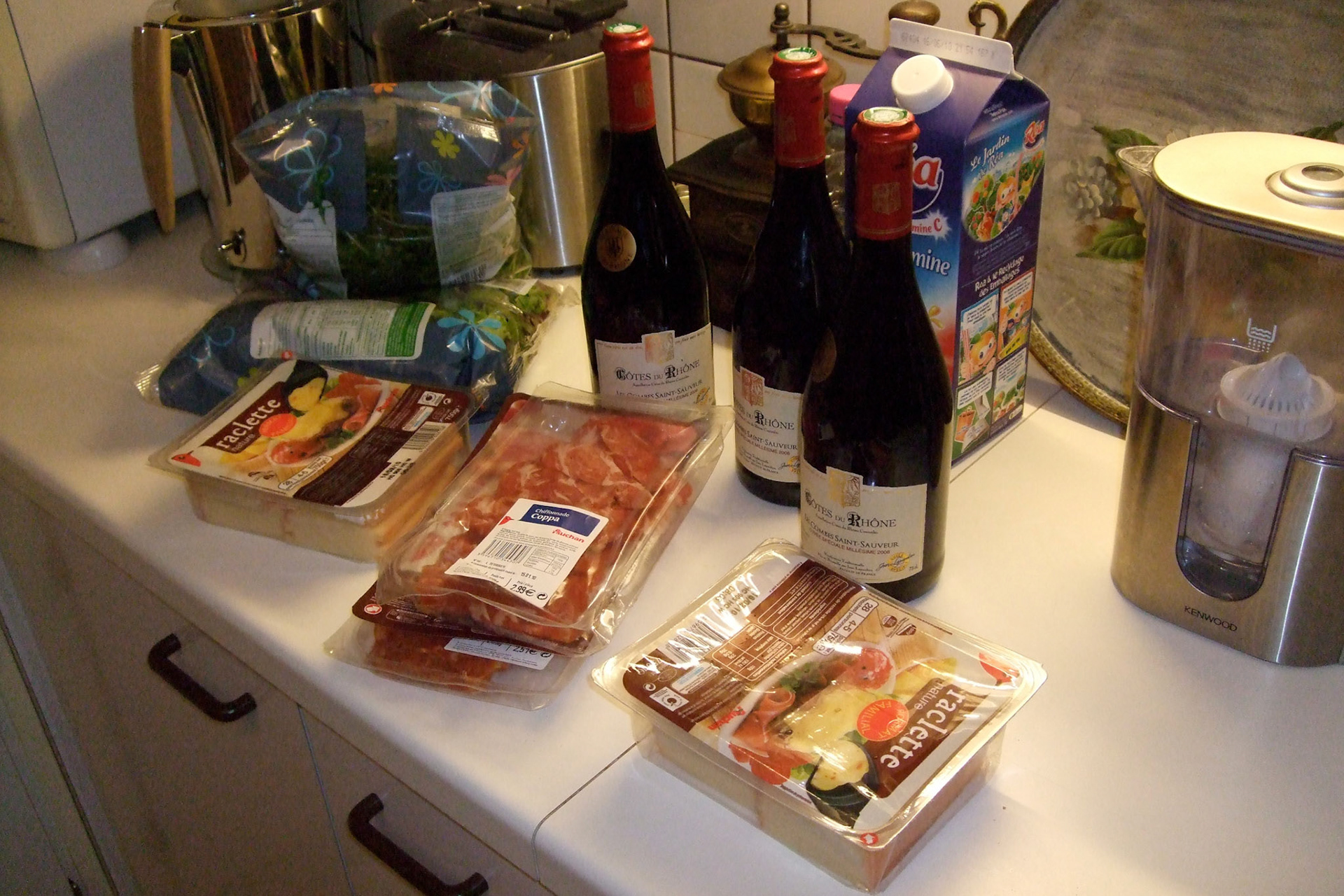 Our dinner ingredients: Raclette (a special type of cheese for melting) and three bottles of wine.