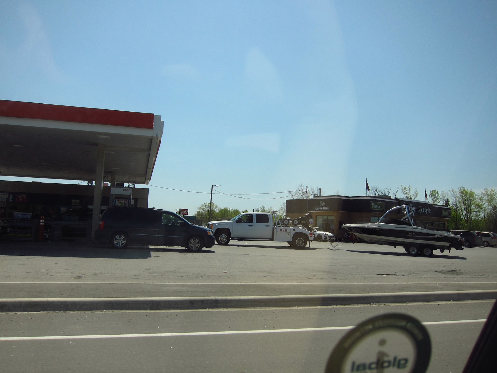 Entering cottage country on highway 7 to Ottawa: this boat seems to be illegally parked