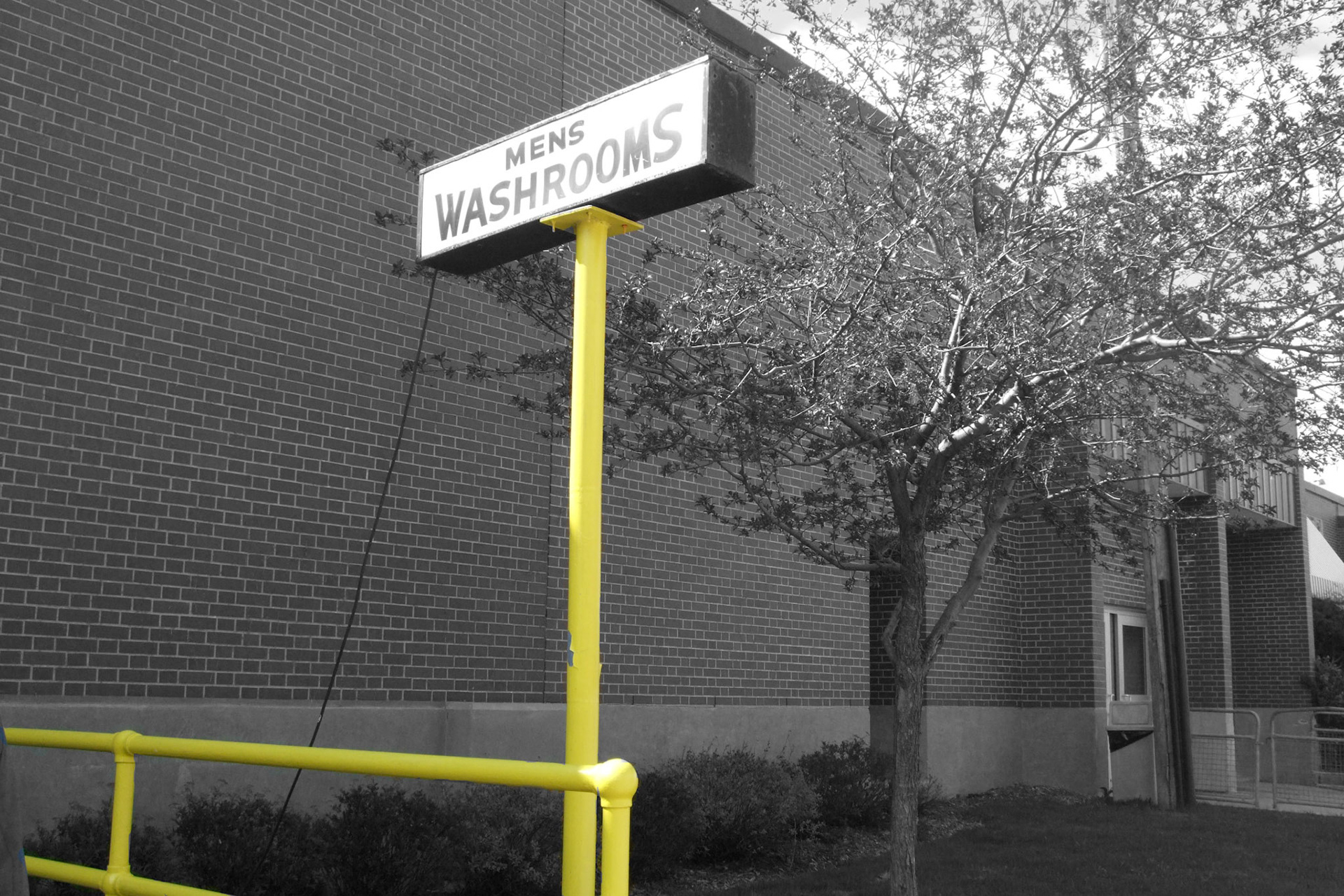 More of the super-bright yellow paint at the Western Fair, and a vintage-looking washroom sign.