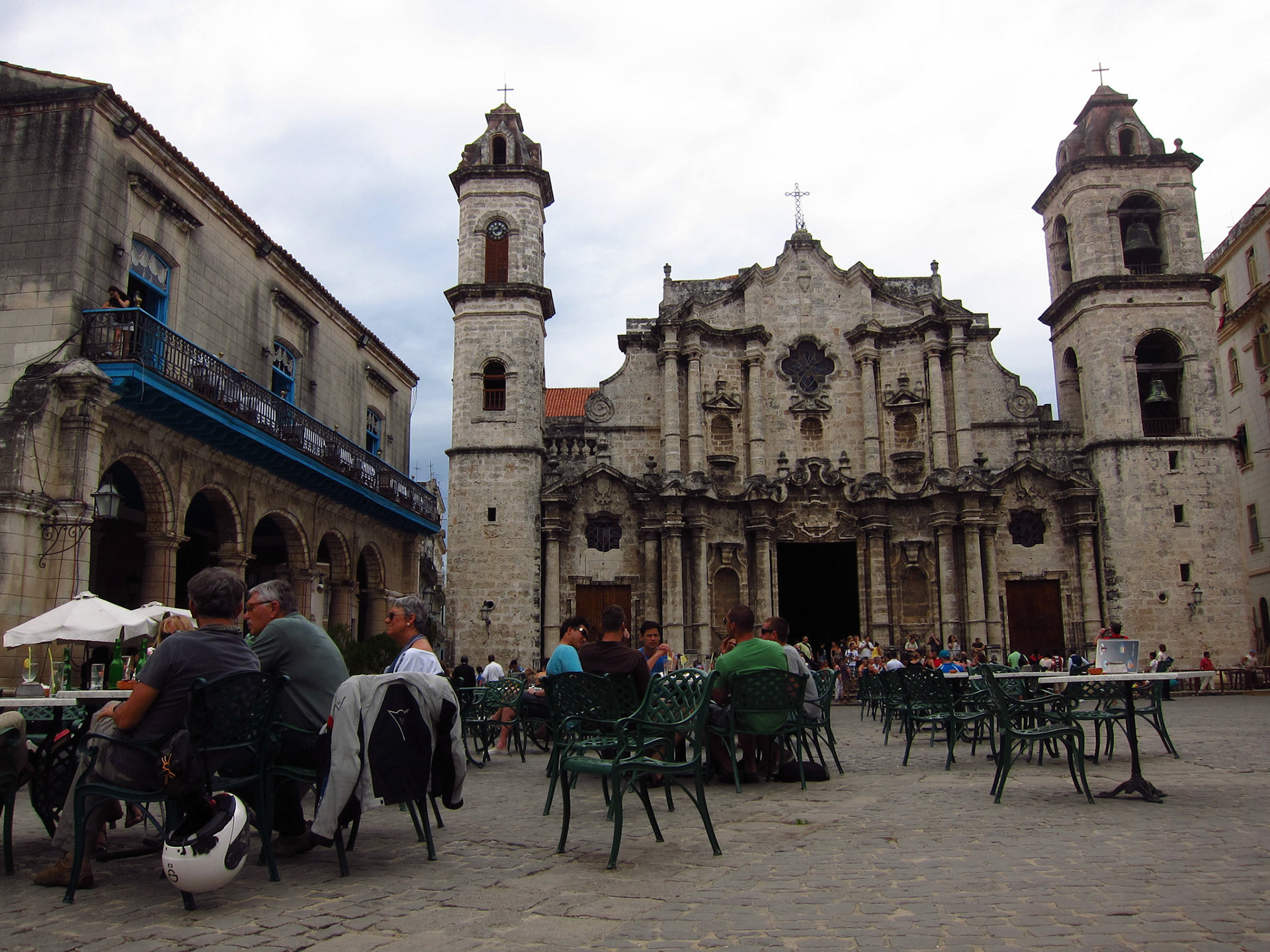 A public squre in front of a beautiful church in Havana