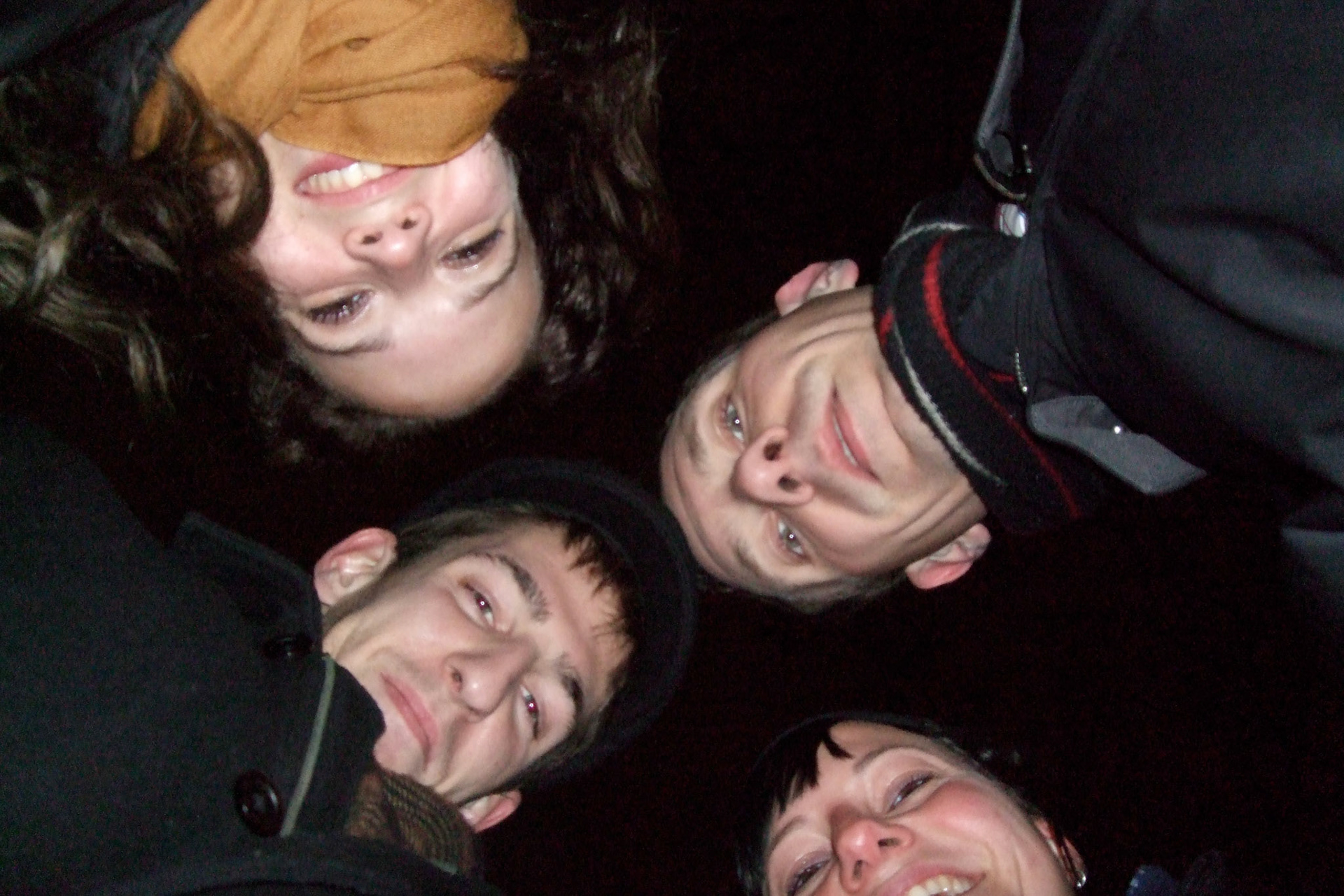 The four travellers ready for New Year's fun at the Eiffel Tower. Tamara, Matt, Mara and me
