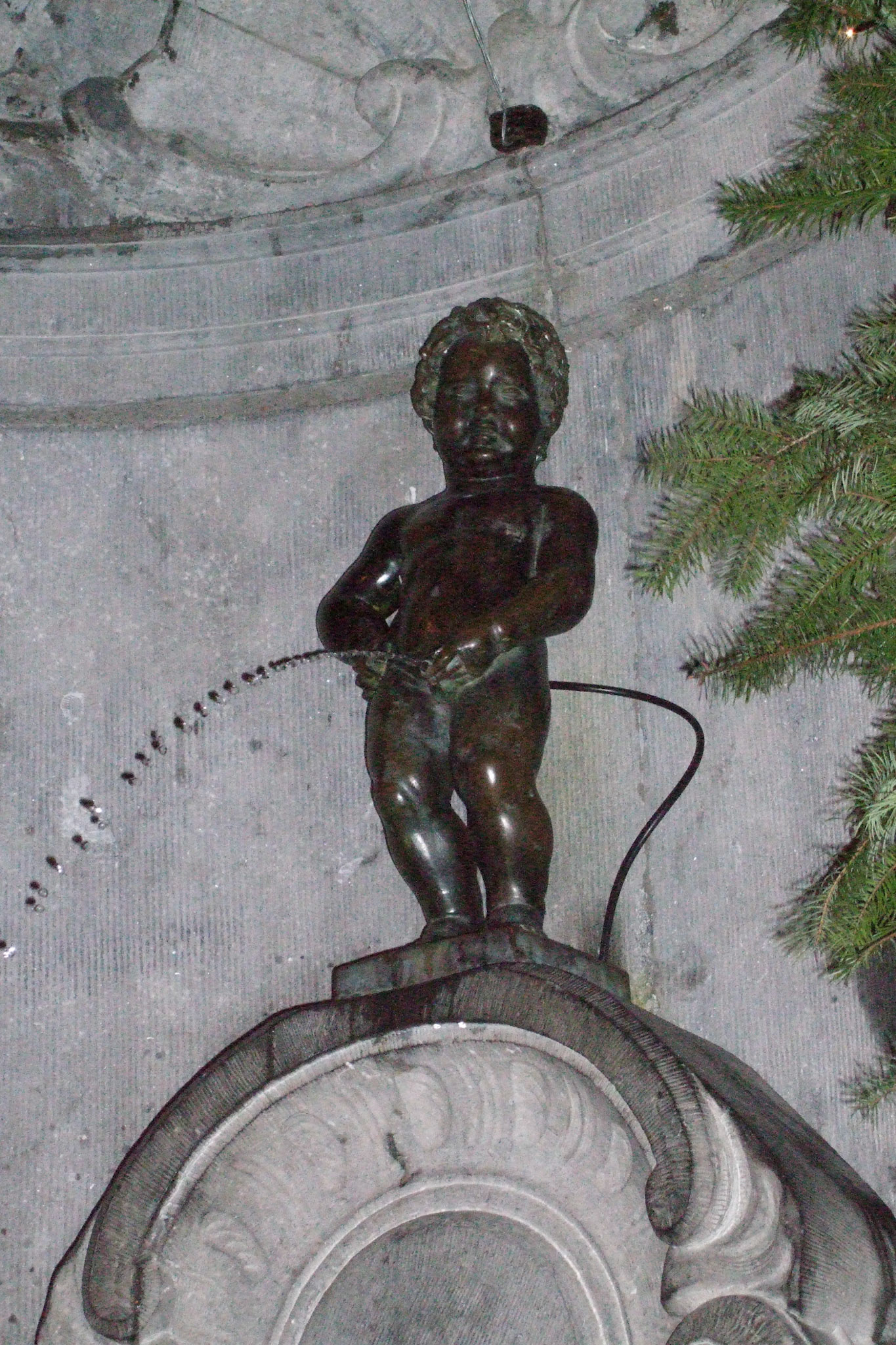 One of the other famous sites in Brussels, "Manneken Pis" (literally "peeing fountain")