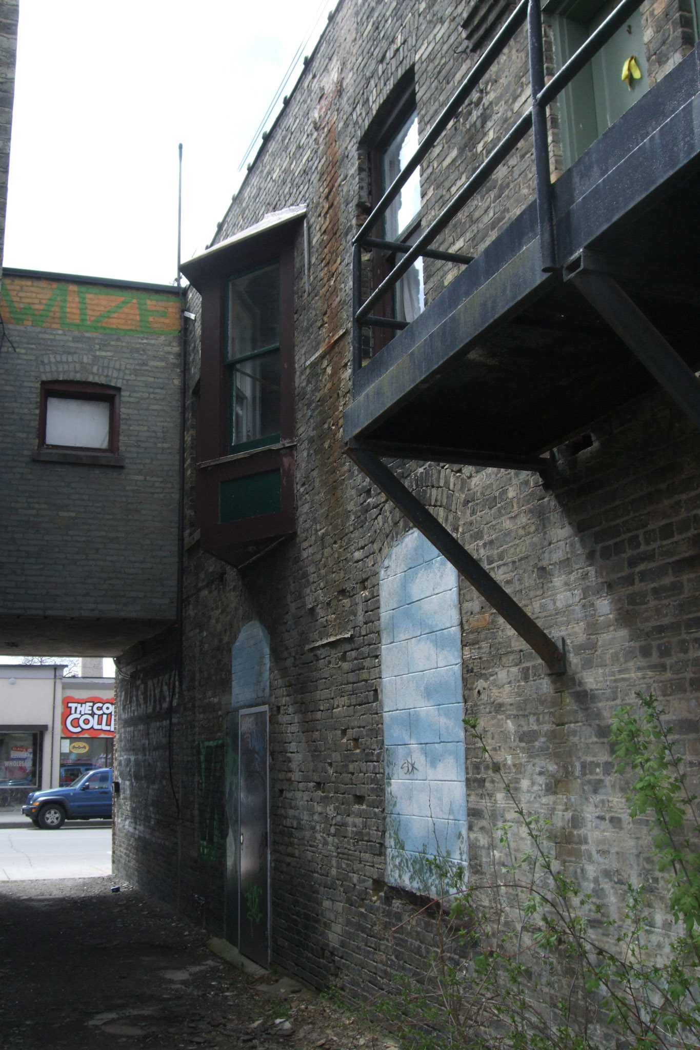 Details of the brickwork and windows in the back alley