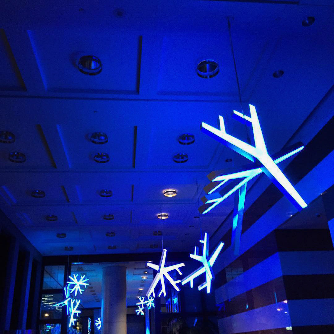 Funky abstract snowflakes casting a moody glow