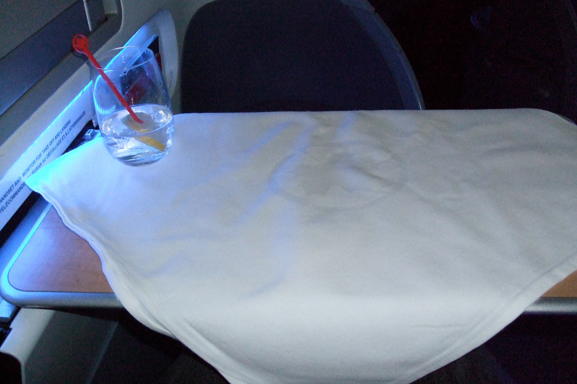 Groovy lighting in my 1st class pod, table cloth, and a G&amp;T