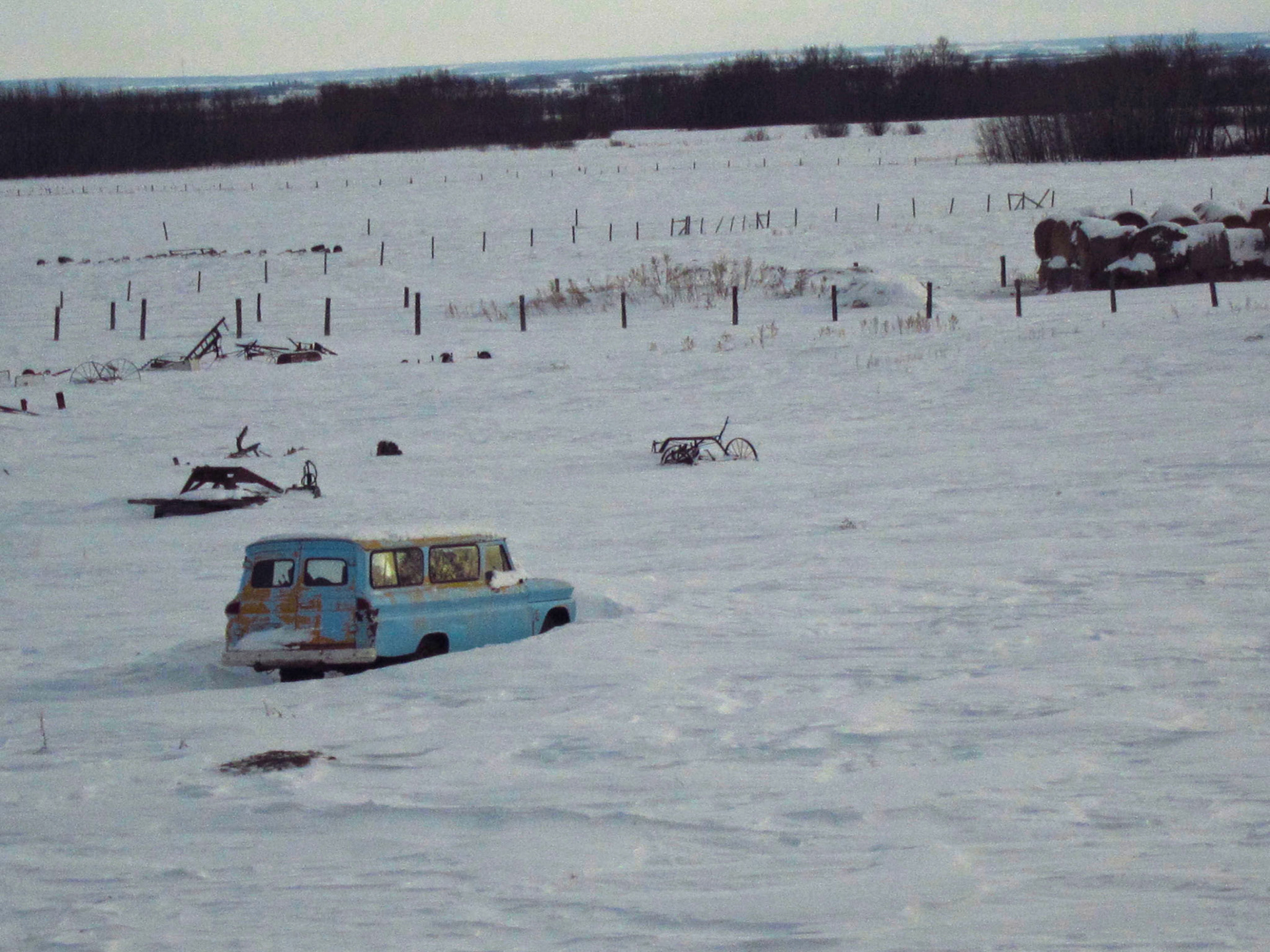 Winter scene in the prairies. That vehicle isn't going anywhere fast