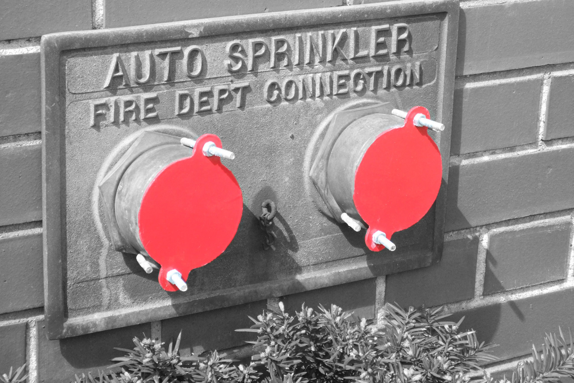 More bright red - a sprinkler connection on an Old East building