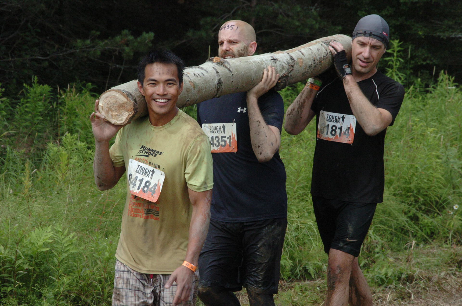 Carrying a wodden log for something like a mile