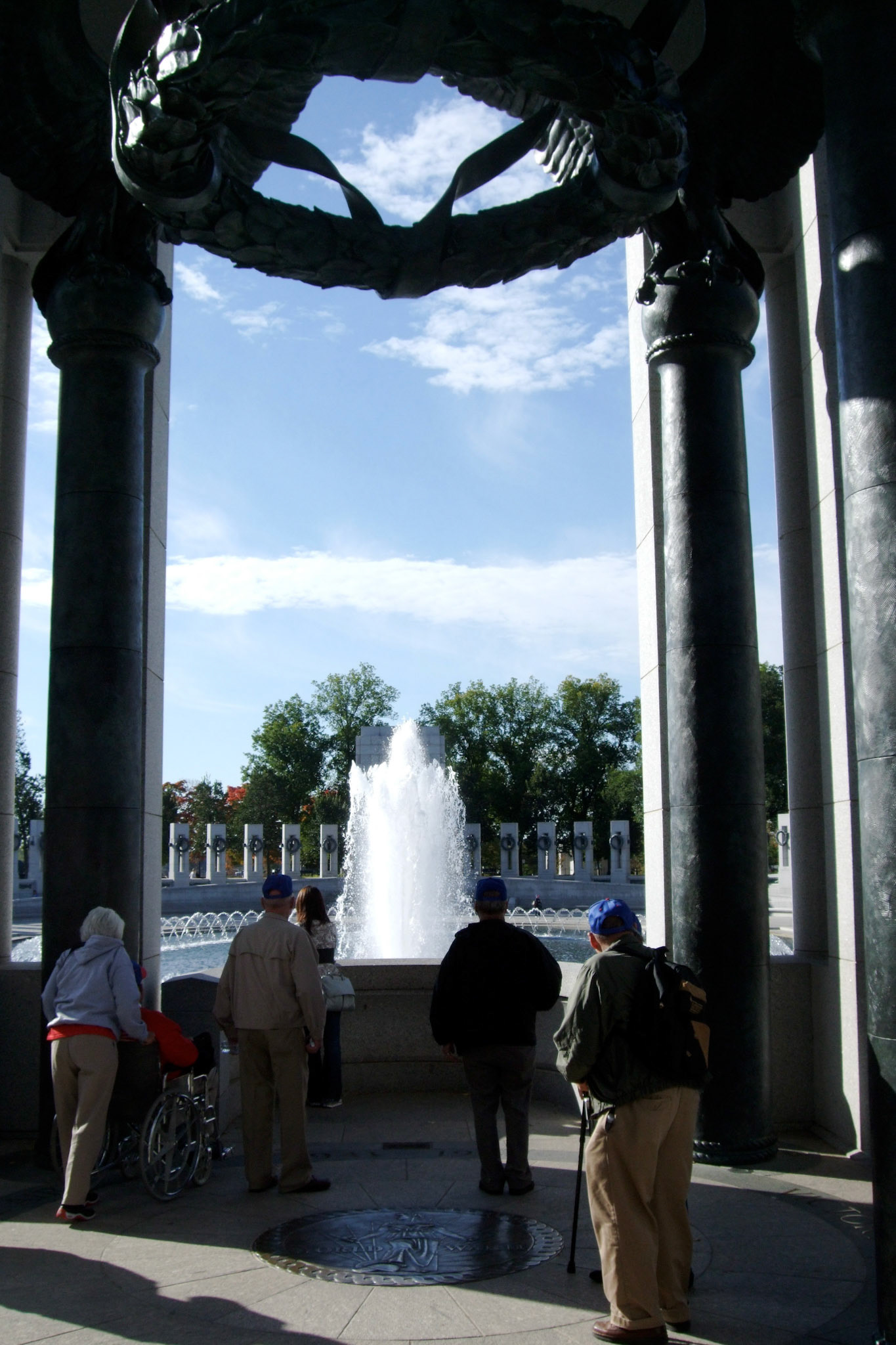 Veterans and their families tour the World War II memorial