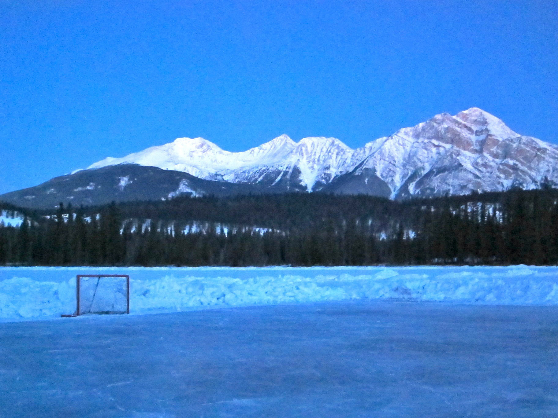 Skating on the lakes at Jasper Park Lodge with the mountains around you is incredible