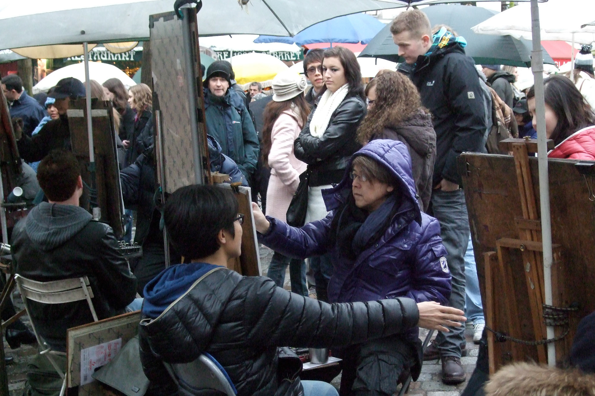 Not sure why this tourist wanted his portrait done with his arm hanging out...