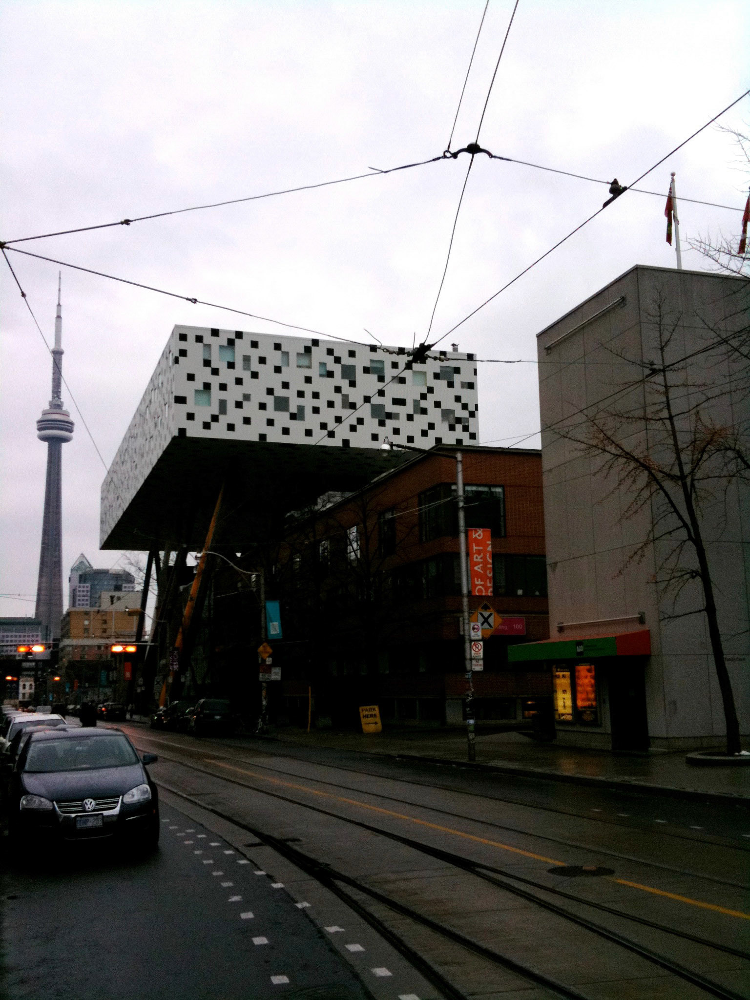 Walking to the AGO, the awesome OCAD building up on stilts with the CN tower behind