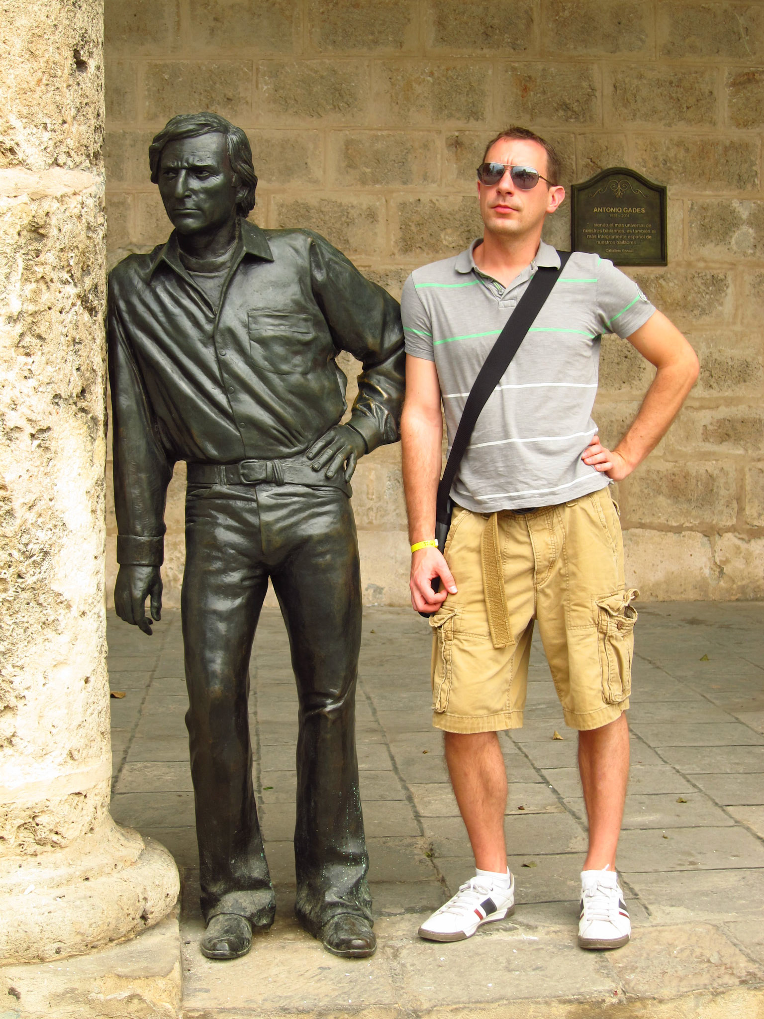 Posing beside a sculpture in Havana