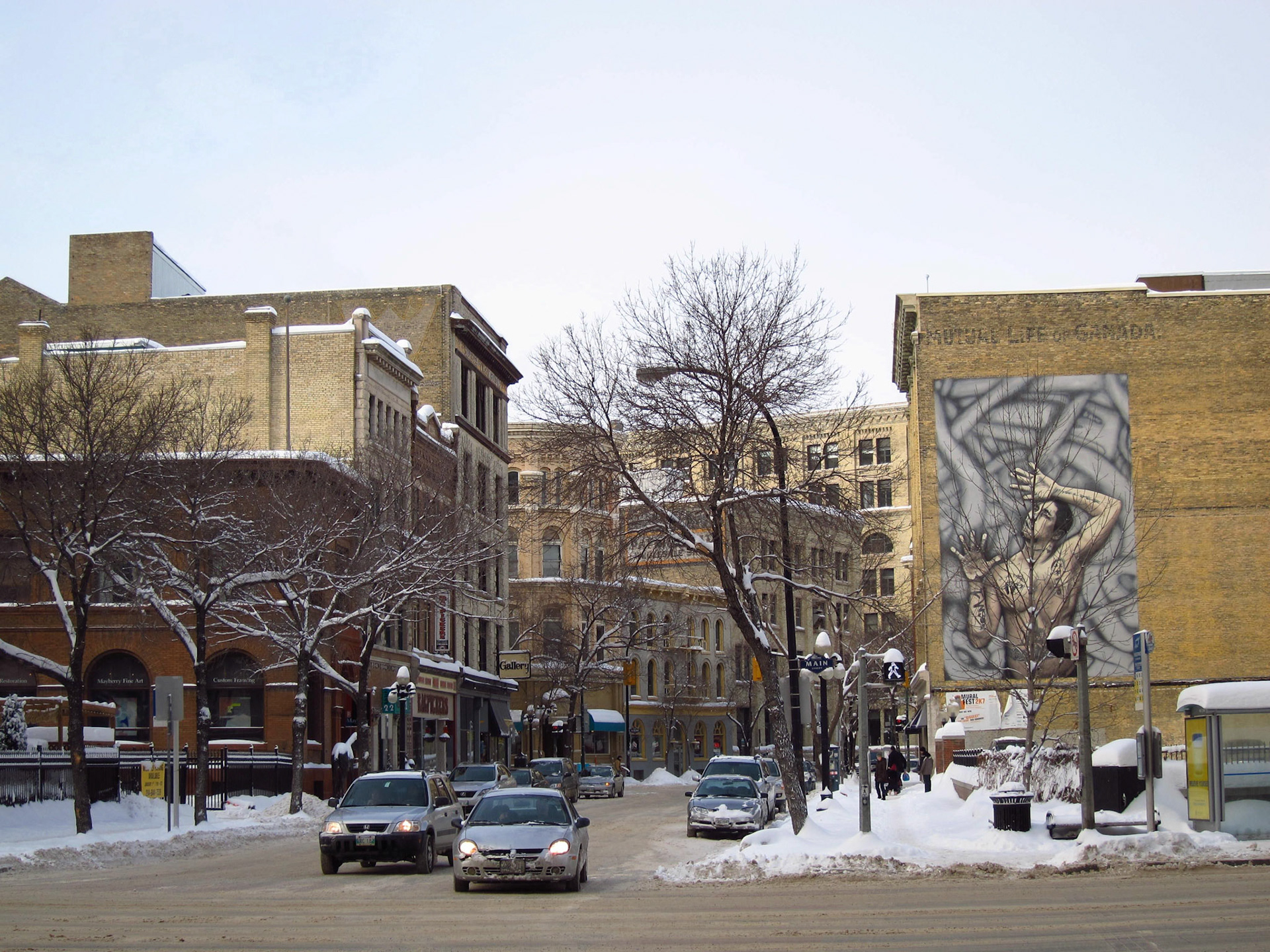 The Exhange District today is home to art, restaurants, boutiques and neat murals like this one