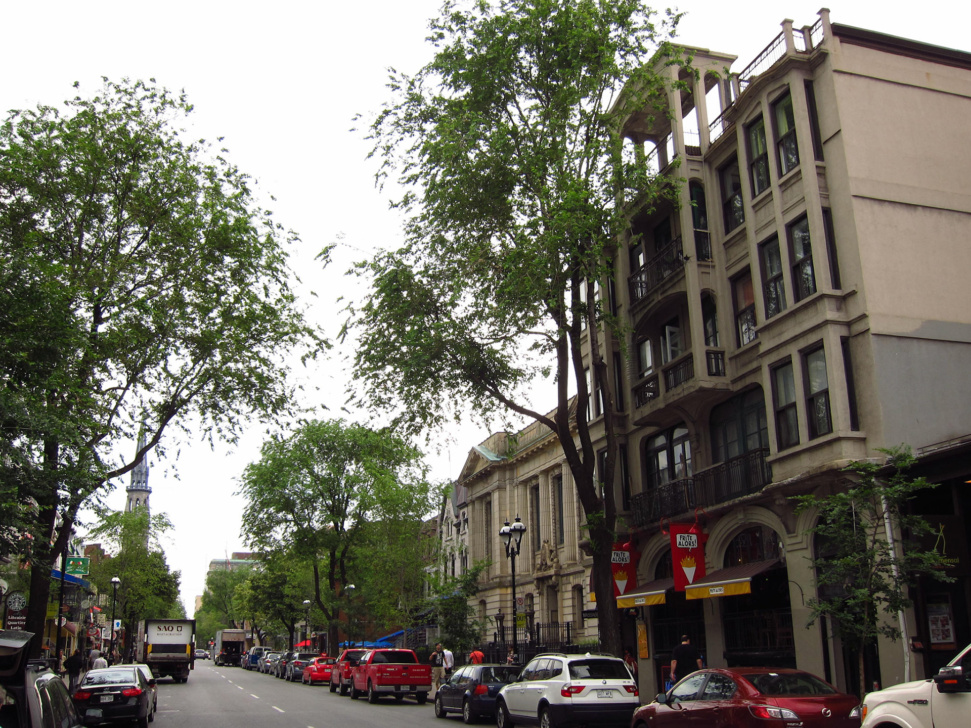 Along Rue Sainte-Denis in the Latin Quarter. In the distance the spire at Université du Québec à Montréal