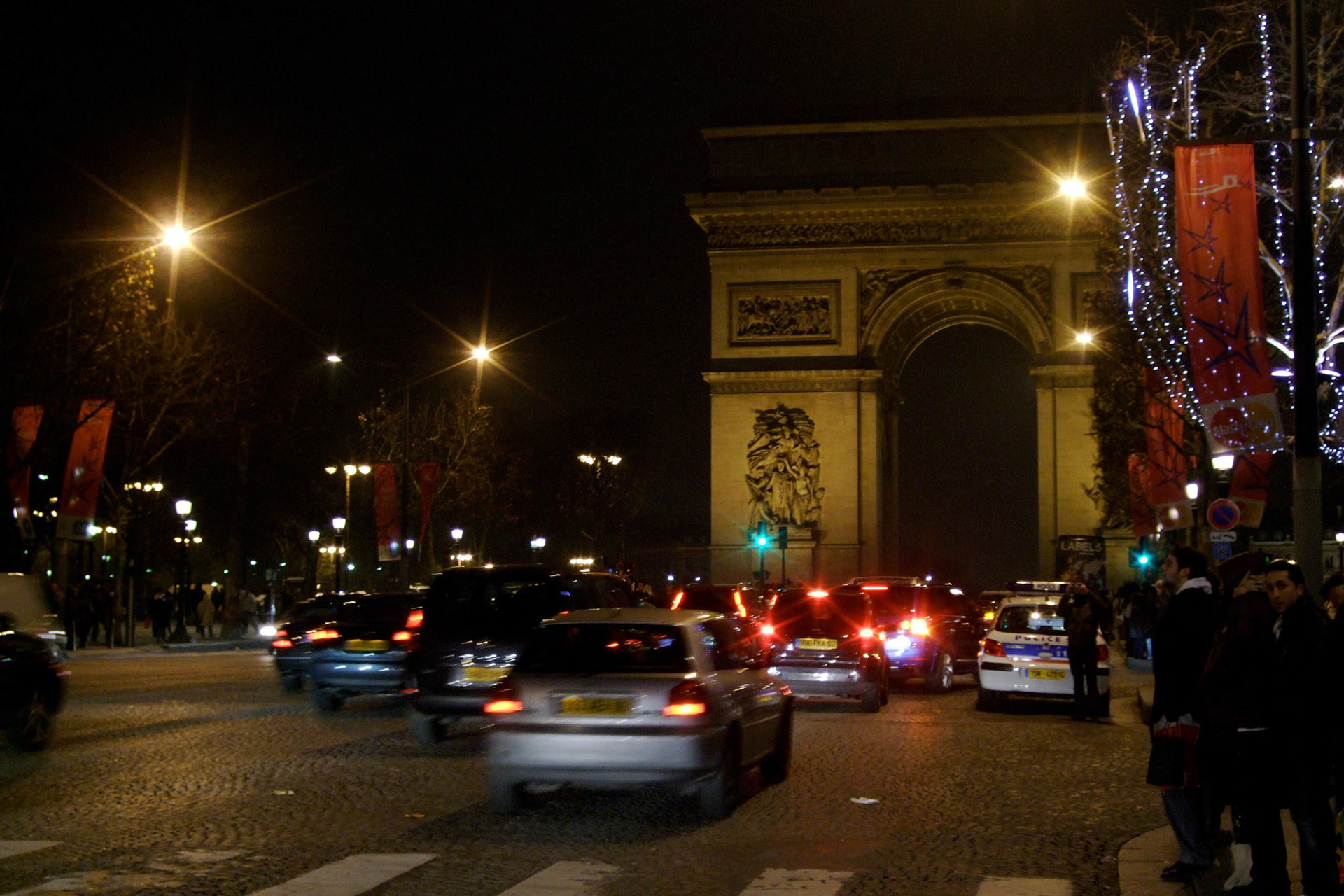 As evening fell on New Year's Eve, we checked out the Champs Elysees. The Arc de Triomphe in the background
