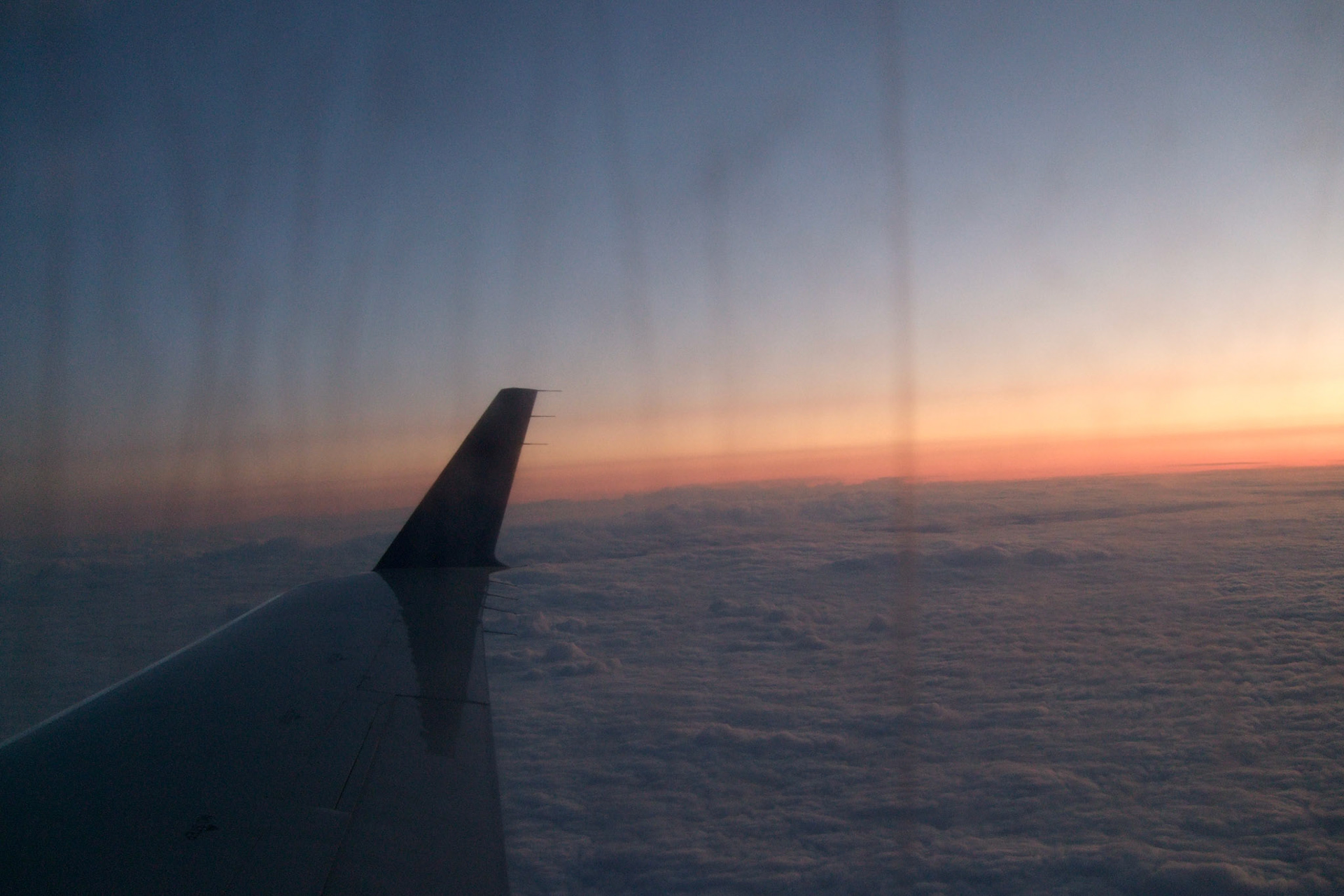 Sunrise high above Lake Michigan en route from London to Chicago, first leg of my trip
