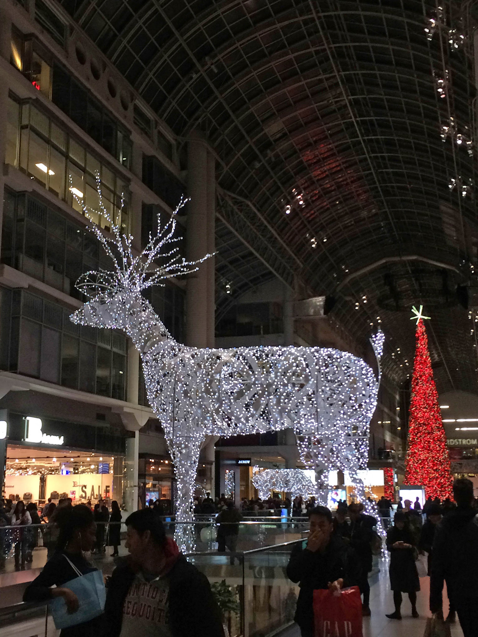 The collosal space of the Eaton Centre atrium is perfect for the massive reindeer and Canada's tallest Christmas tree