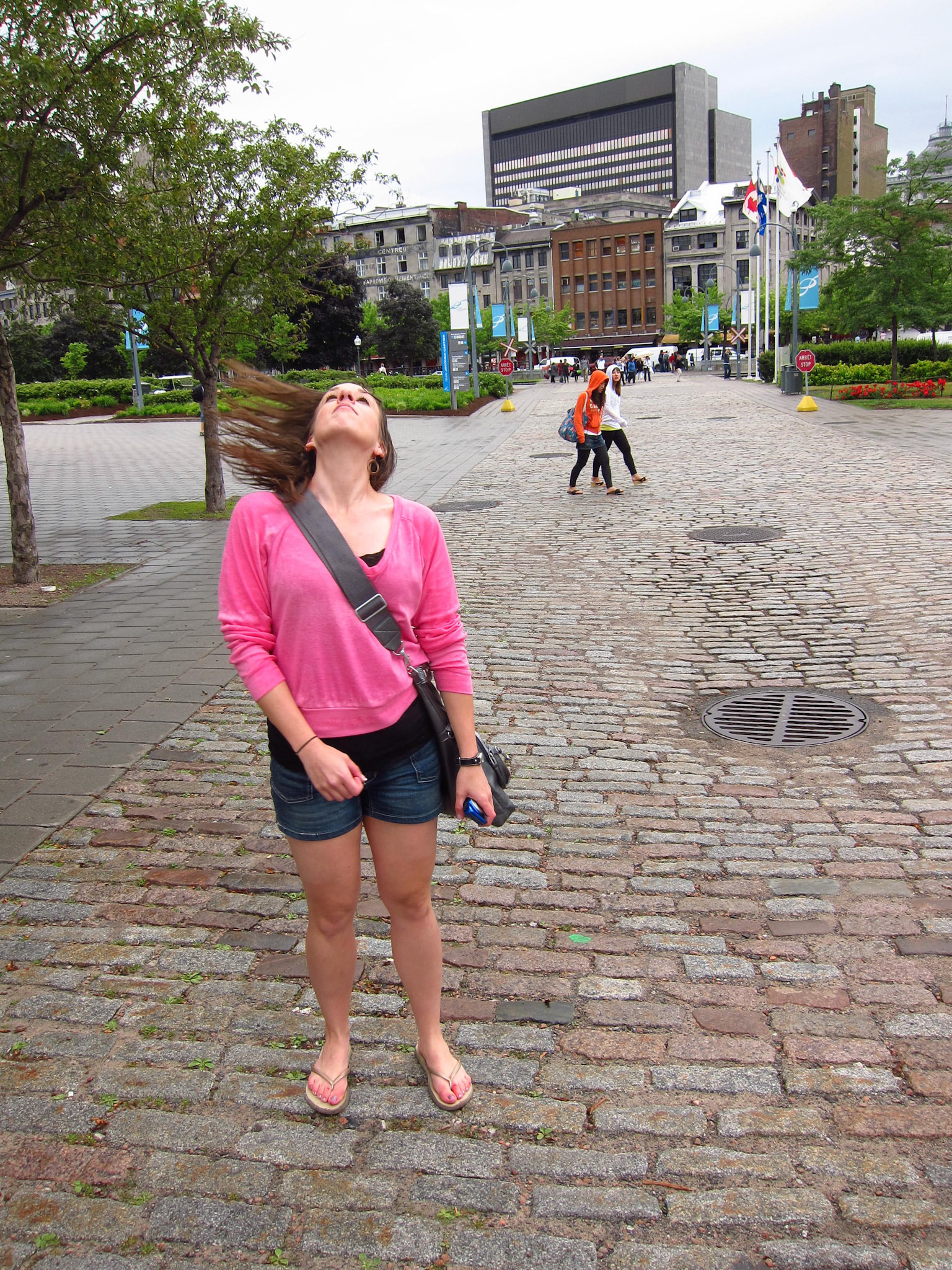It rained on our Bixi bike ride: Kelly demonstrates that her hair is wet