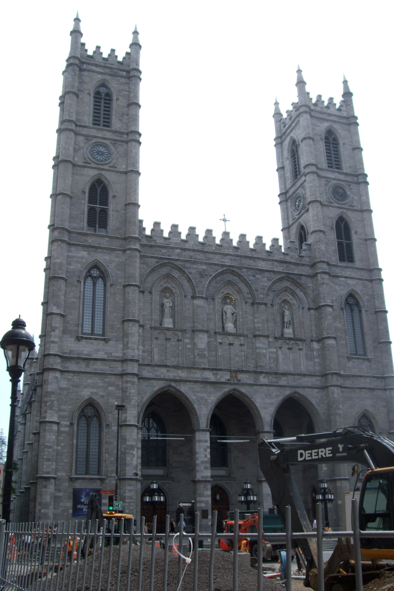 Construction at Place d'Armes obscrures my vantage of Notre-Dame Basilica